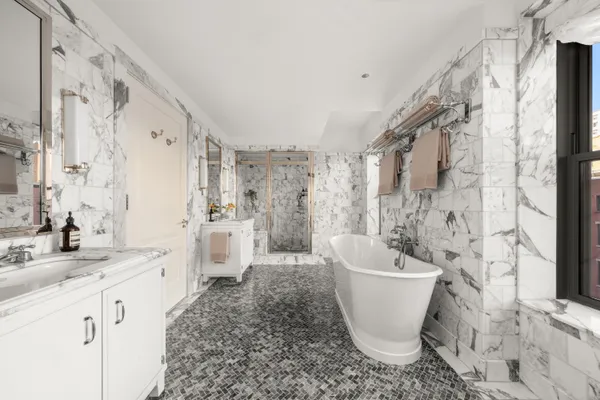 a living room with furniture and white walls