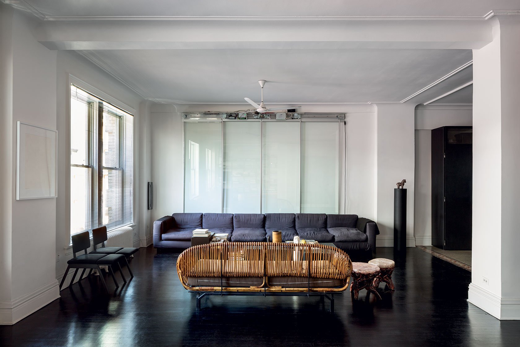 366 Broadway, Unit 5C Manhattan, NY 10013 - Photo 2 of 18 a living room with furniture and a chandelier