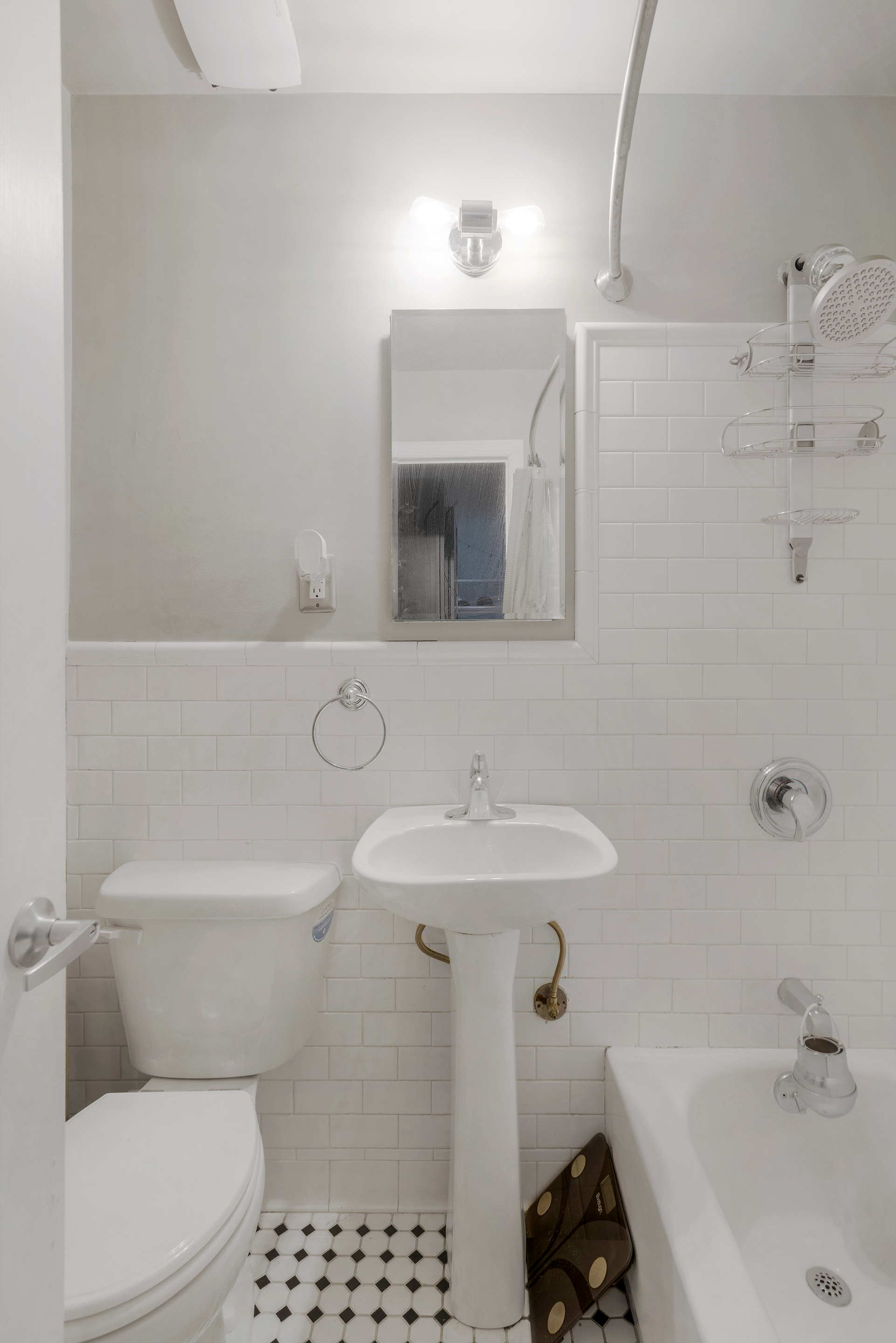 439 Hicks Street, Unit 1B Brooklyn, NY 11201 - Photo 7 of 7 a bathroom with a sink a toilet and shower
