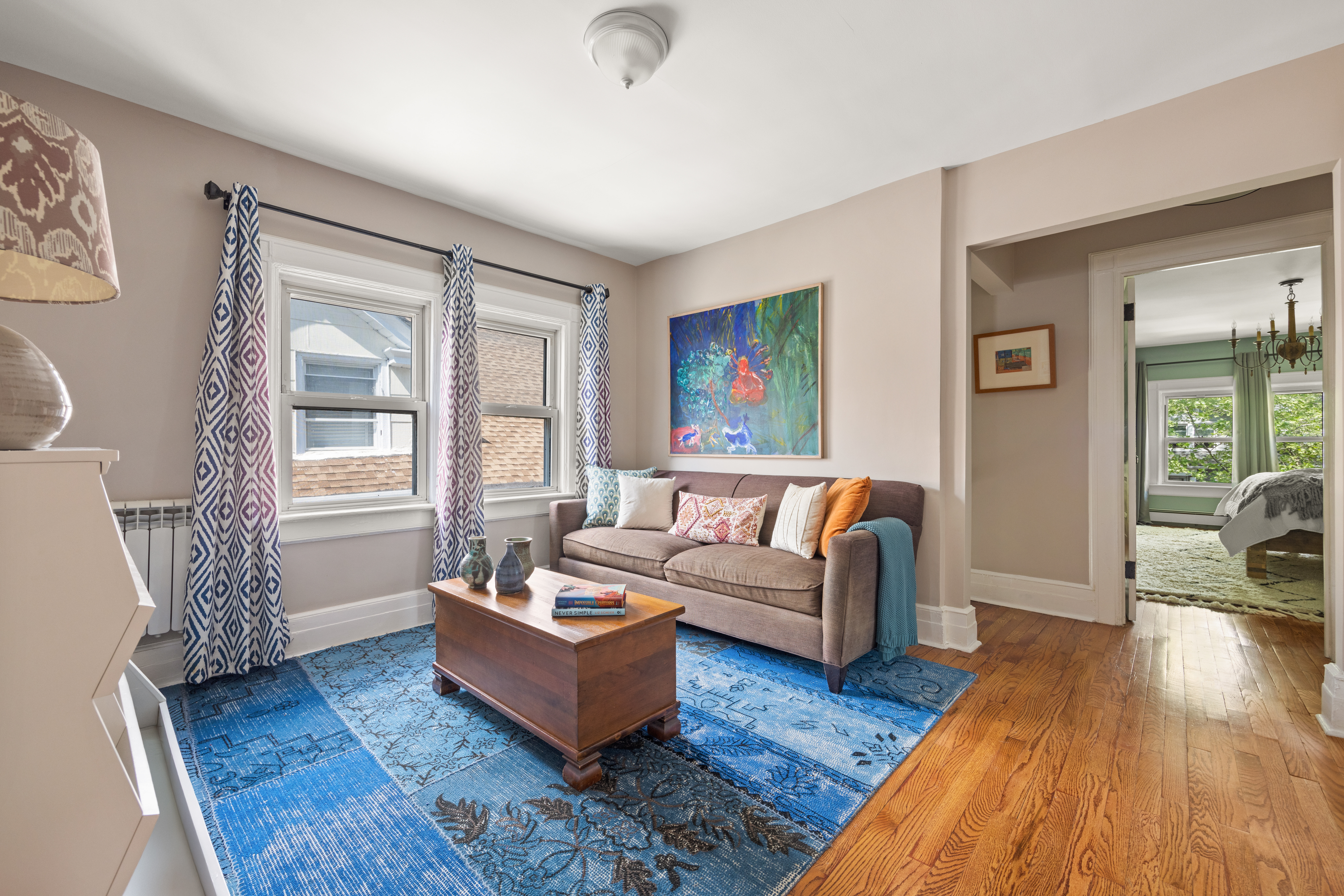 758 Westminster Road Brooklyn, NY 11230 - Photo 17 of 32 a living room with furniture and a wooden floor