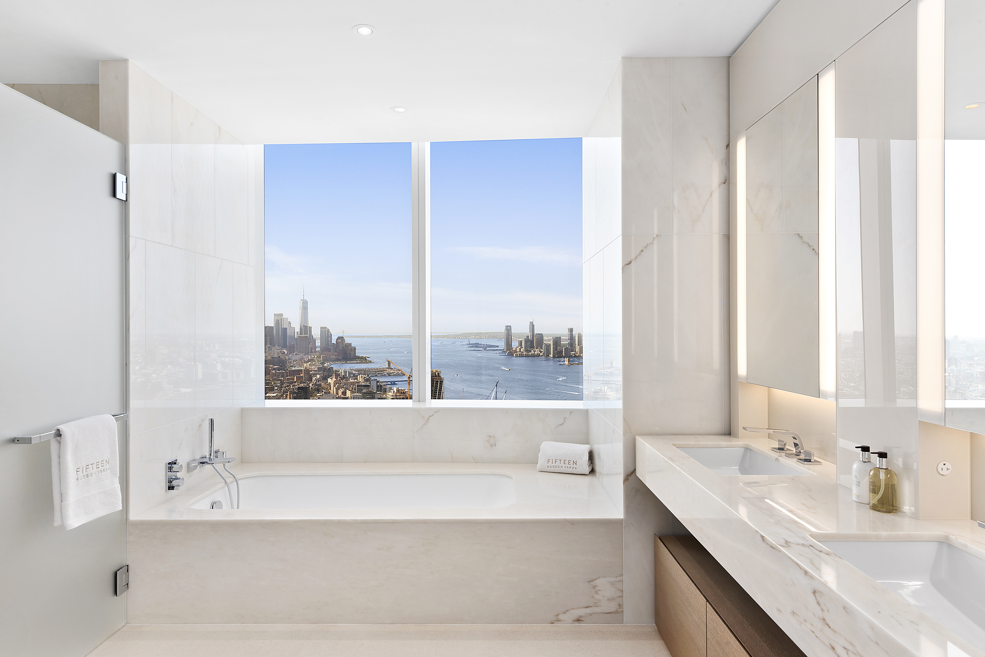 15 Hudson Yards, Unit 75A Manhattan, NY 10001 - Photo 5 of 31 a bathroom with a bathtub and a sink