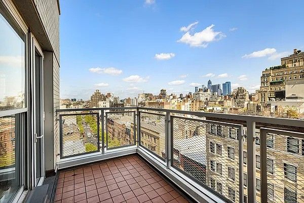 a view of a balcony with city view