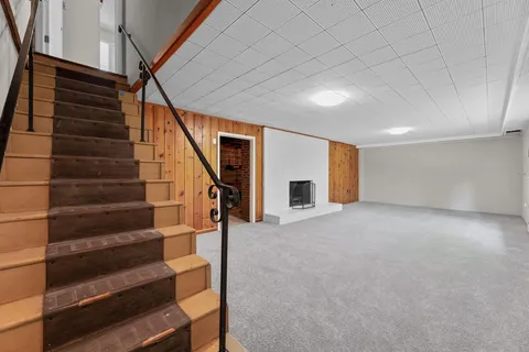 a view of entryway with stairs