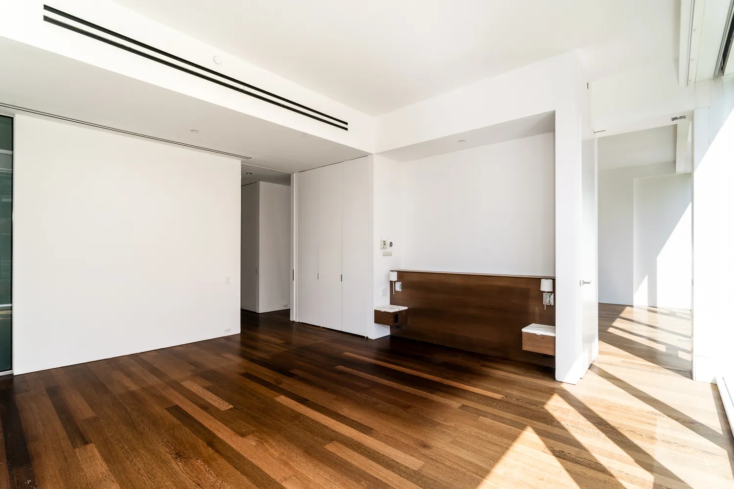 a view of a glass door and a window