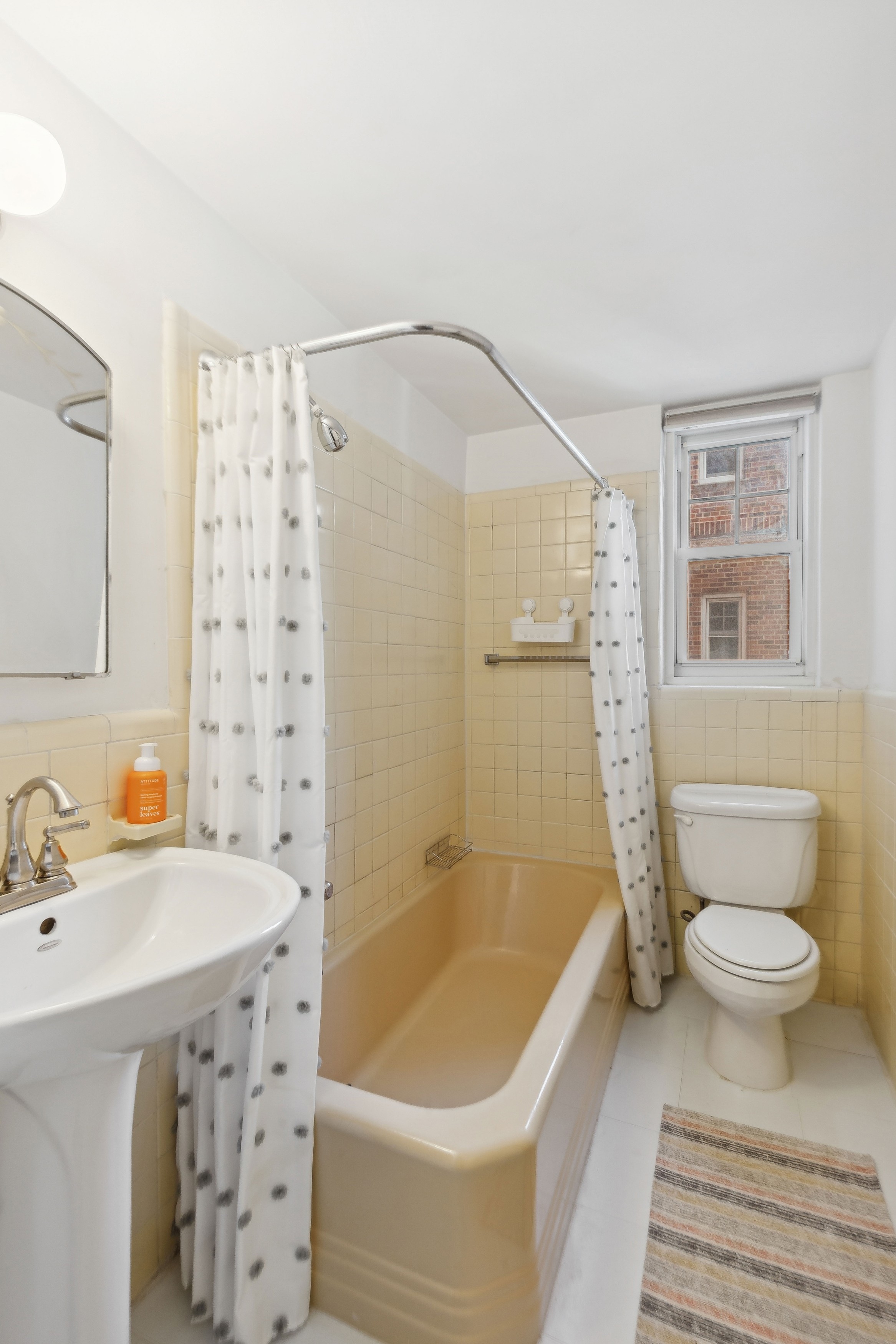120 Cabrini Boulevard, Unit 107 Manhattan, NY 10033 - Photo 14 of 26 a bathroom with a sink toilet and shower