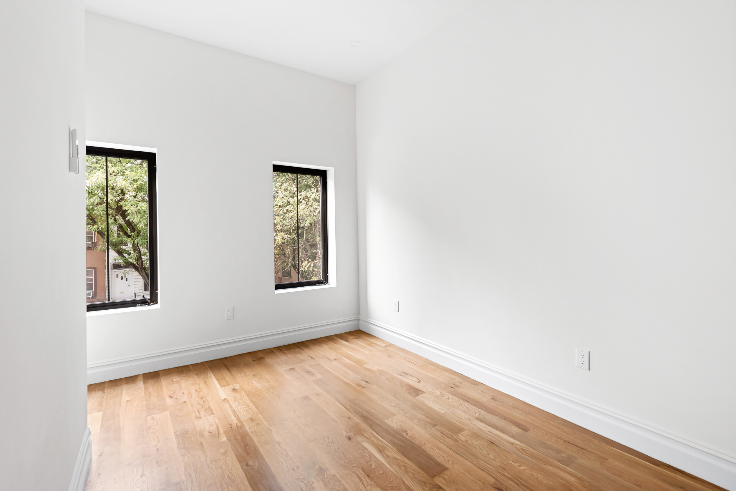 608 Van Buren Street, Unit TWH Brooklyn, NY 11221 - Photo 11 of 15 an empty room with window
