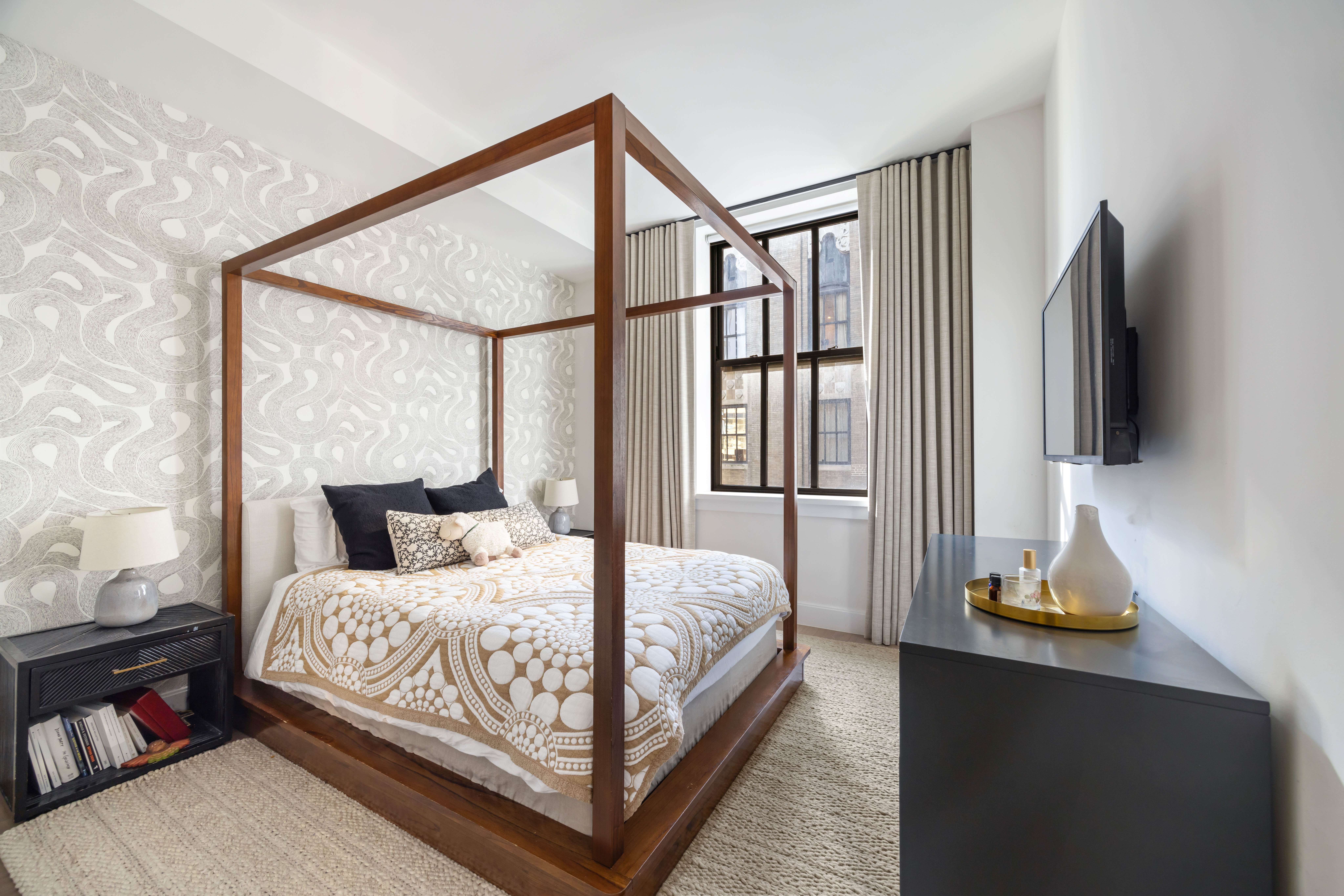 100 Barclay Street, Unit 16G Manhattan, NY 10007 - Photo 12 of 28 a bedroom with a bed window and a flat screen tv