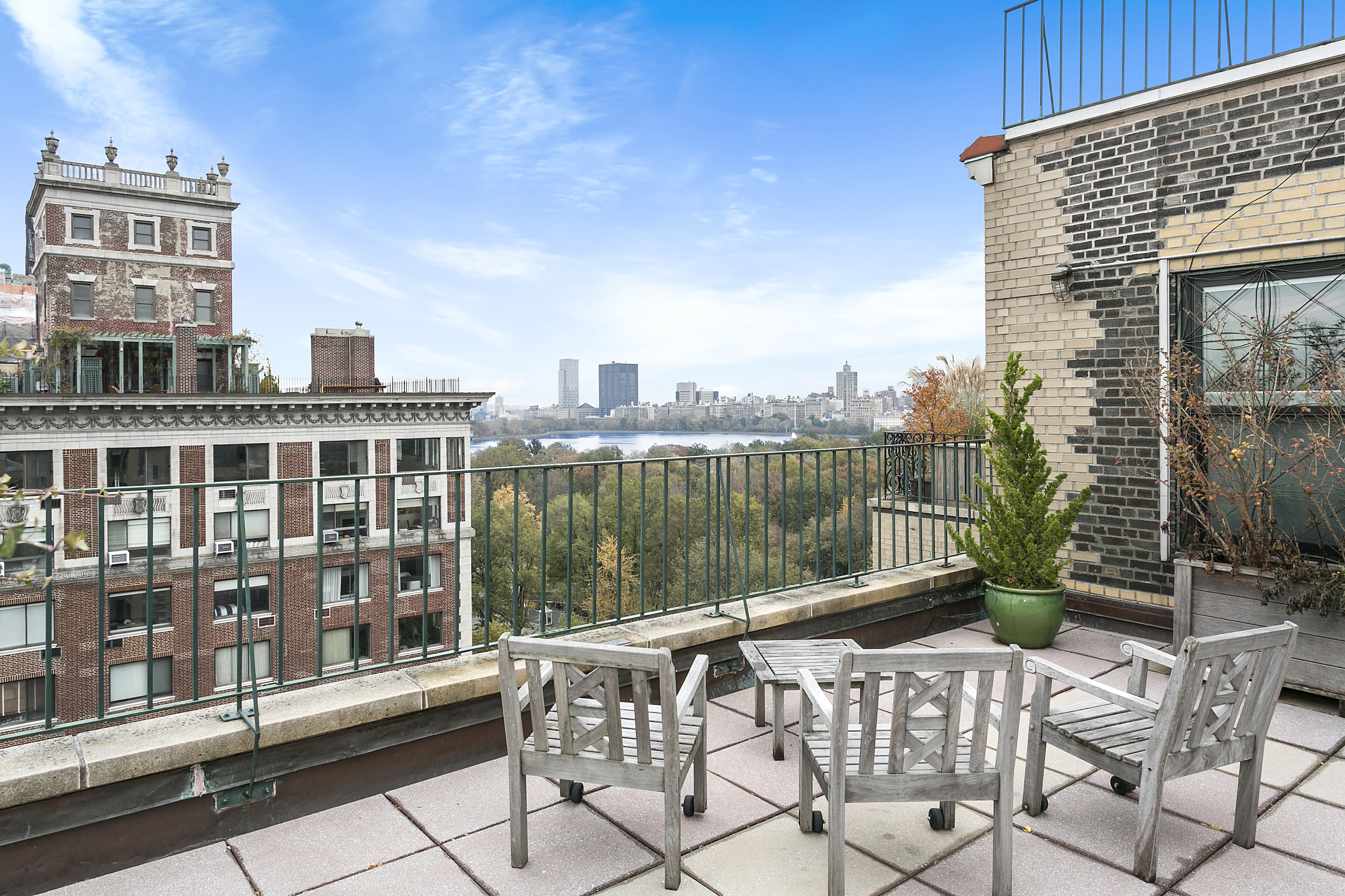 225 Central Park West, Unit 1516 Manhattan, NY 10024 - Photo 12 of 16 a view of balcony with a potted plant and a table
