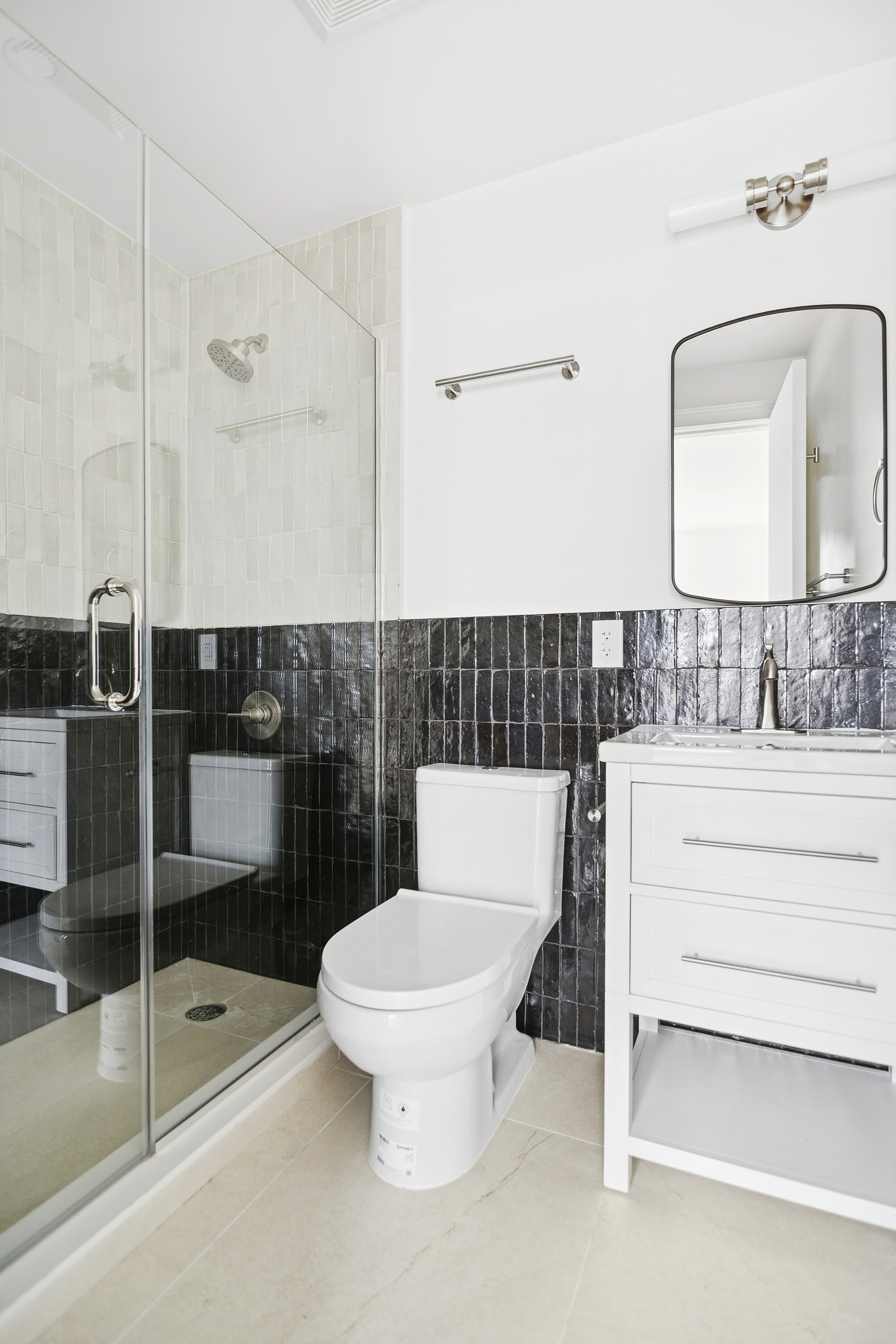 298 Degraw Street, Unit 2 Brooklyn, NY 11231 - Photo 10 of 11 a bathroom with a toilet a sink and shower