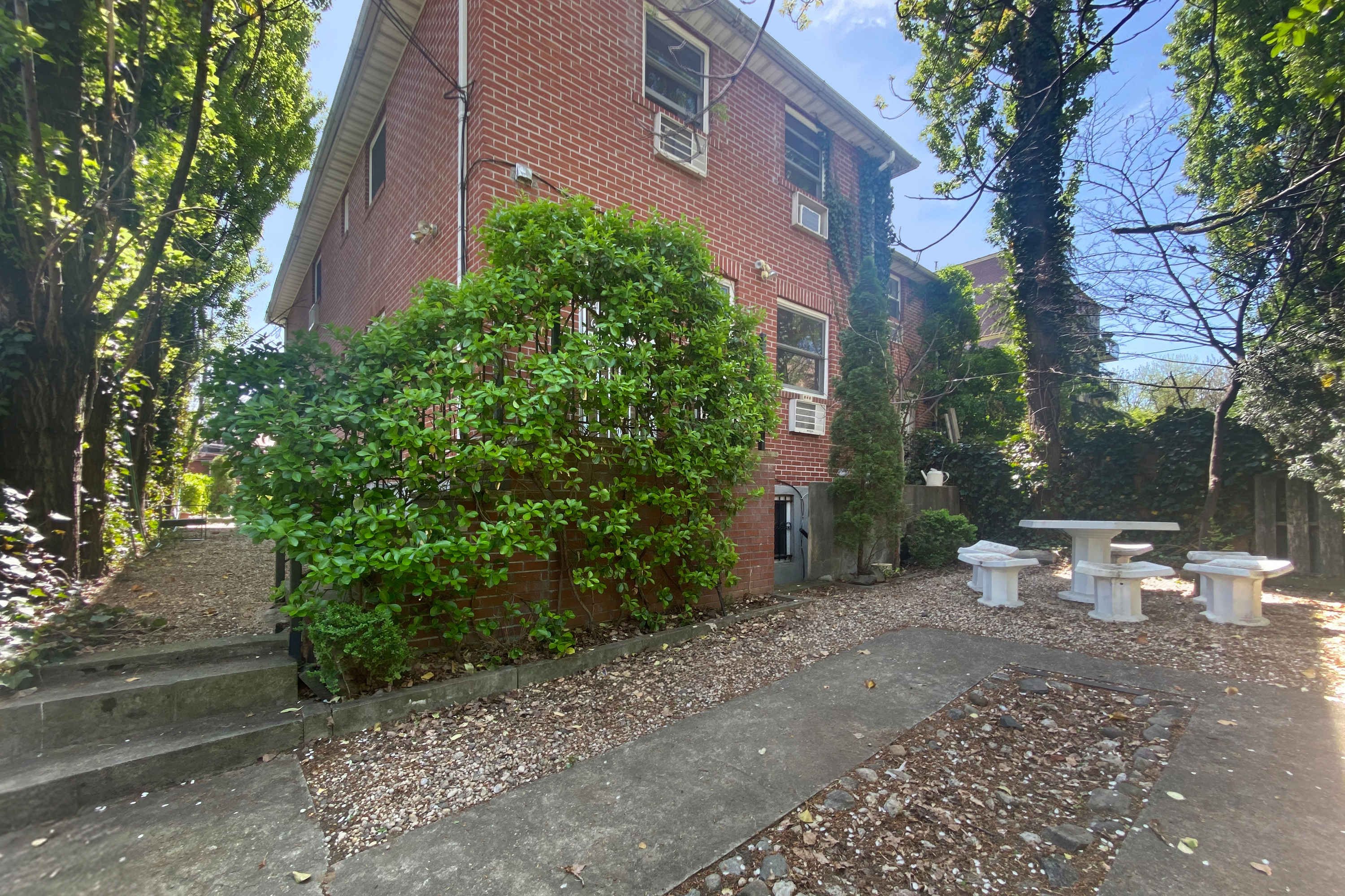 27-02 12th Street, Unit 1 Queens, NY 11102 - Photo 12 of 15 a view of a backyard with sitting area