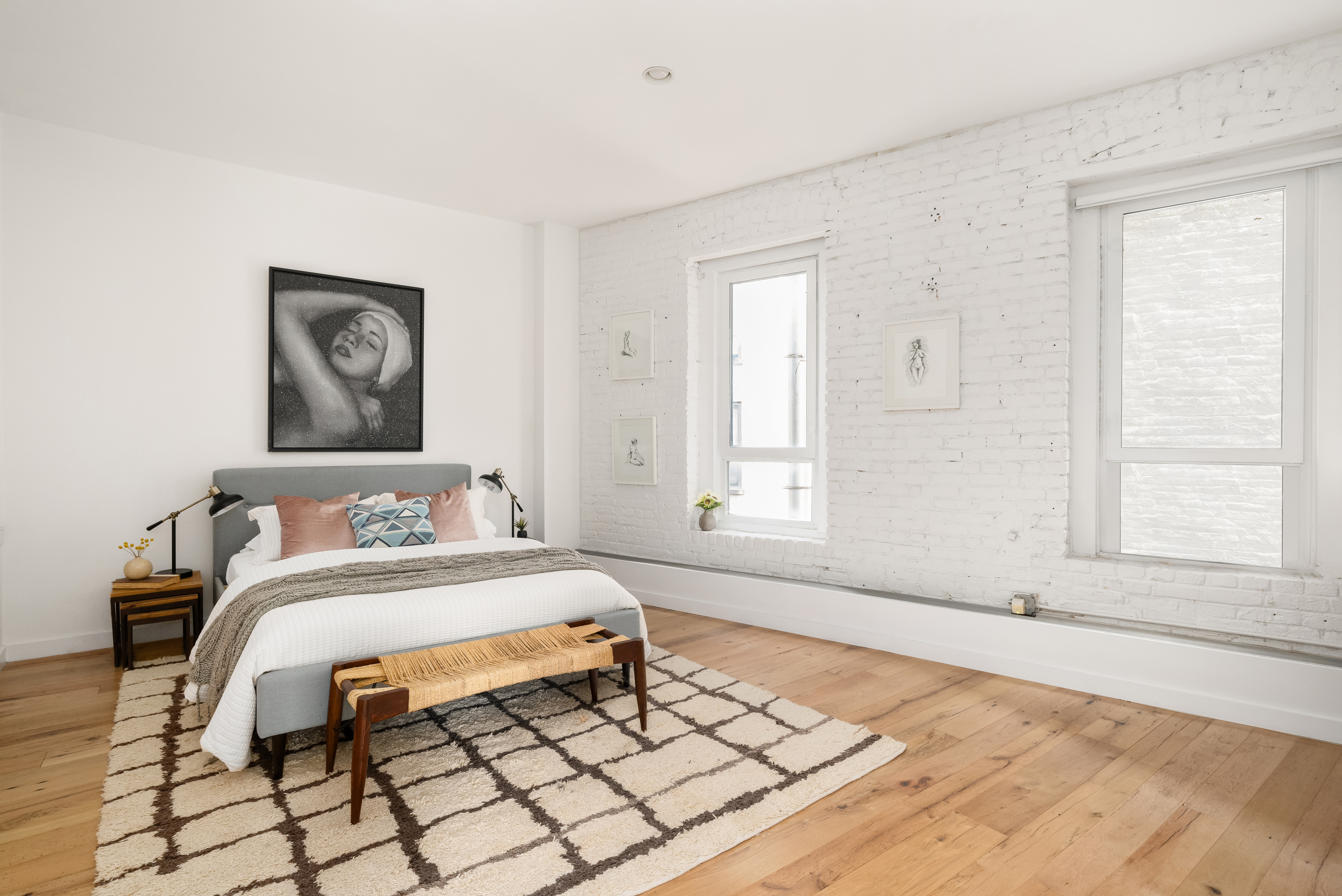 719 Greenwich Street, Unit 3S Manhattan, NY 10014 - Photo 8 of 21 a bedroom with a bed and a window