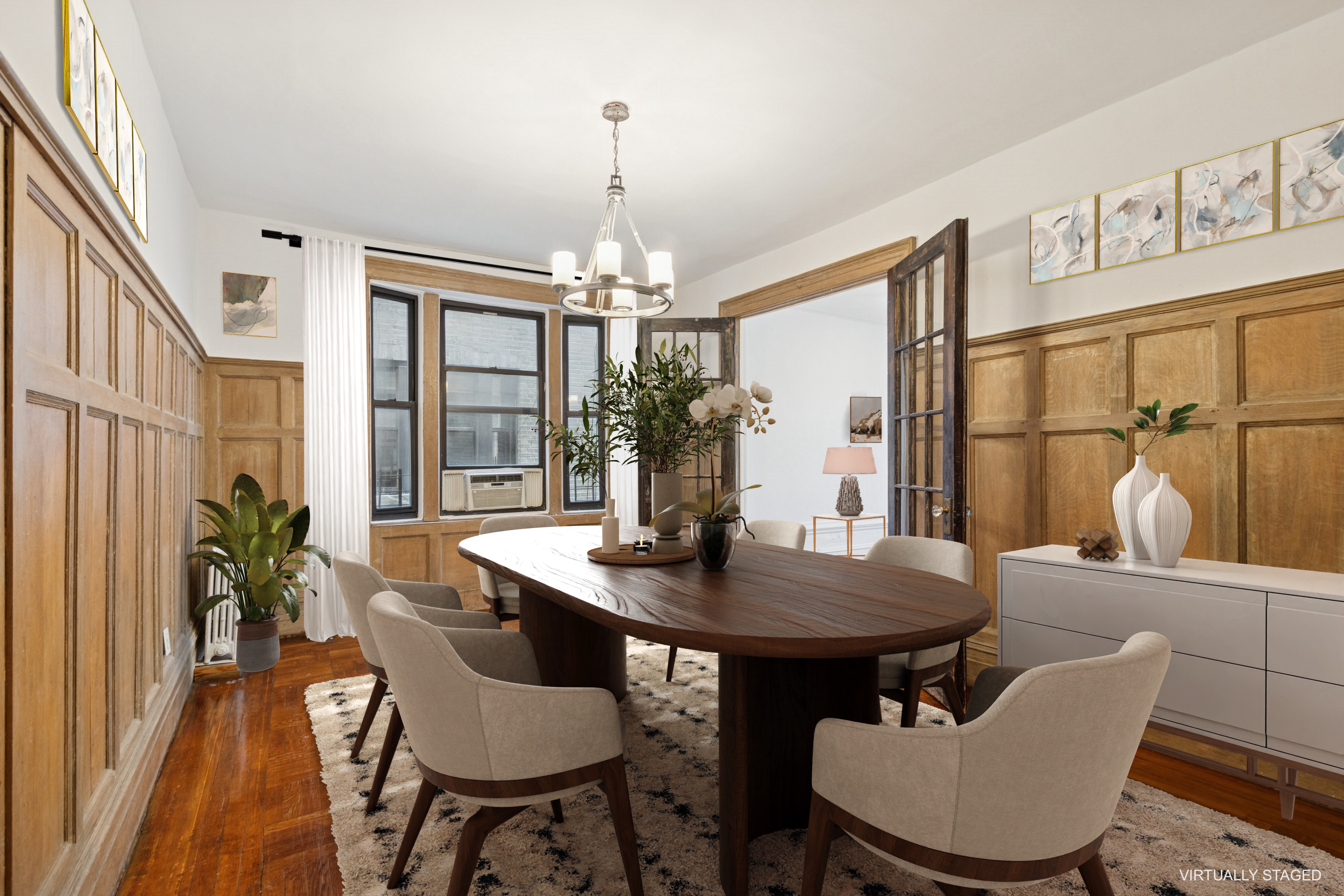 804 West 180th Street, Unit 41 Manhattan, NY 10033 - Photo 3 of 23 a view of a dining room with furniture and chandelier