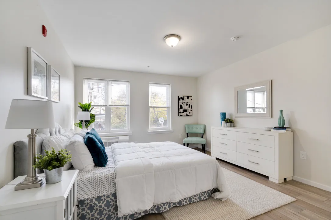 a cars parked in front of brick building