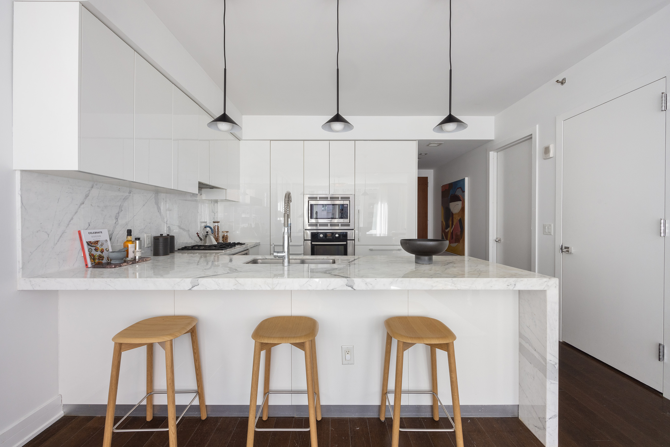 5 Franklin Place, Unit 9D Manhattan, NY 10013 - Photo 5 of 20 a kitchen with cabinets a sink and appliances