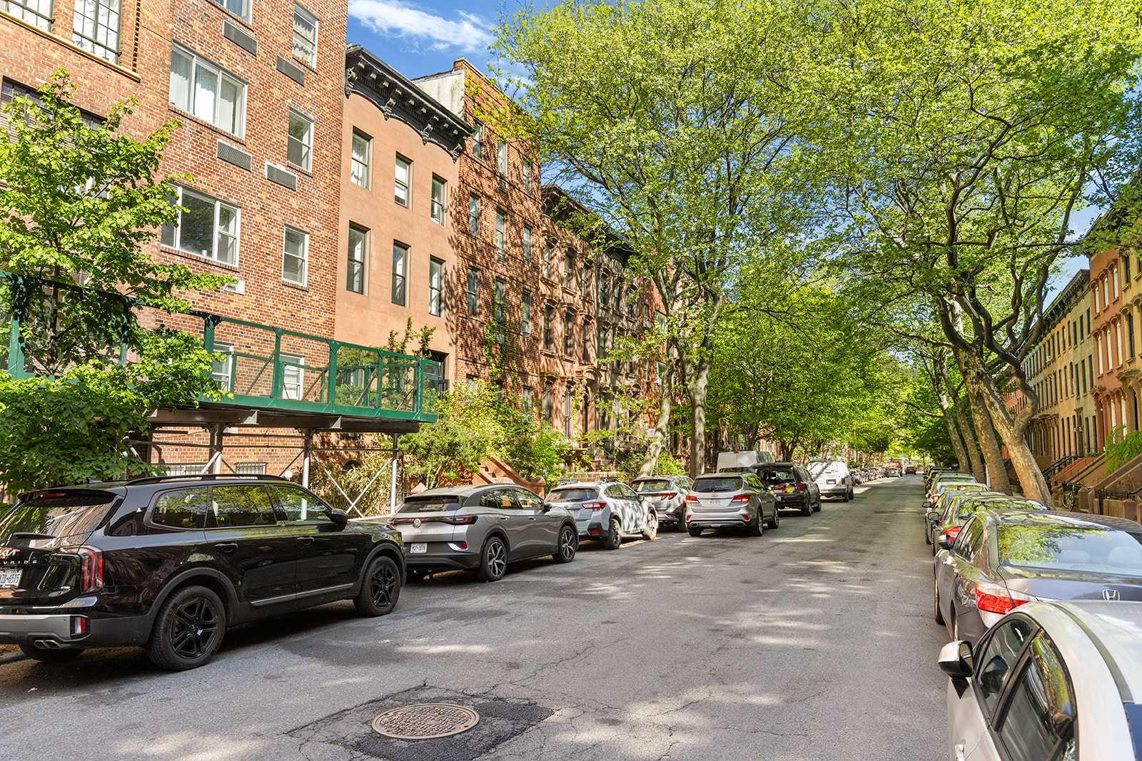 101 Lafayette Avenue, Unit 6D Brooklyn, NY 11217 - Photo 8 of 9 a view of a cars parked in front of a building