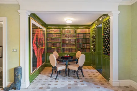 a workspace with furniture and a potted plant