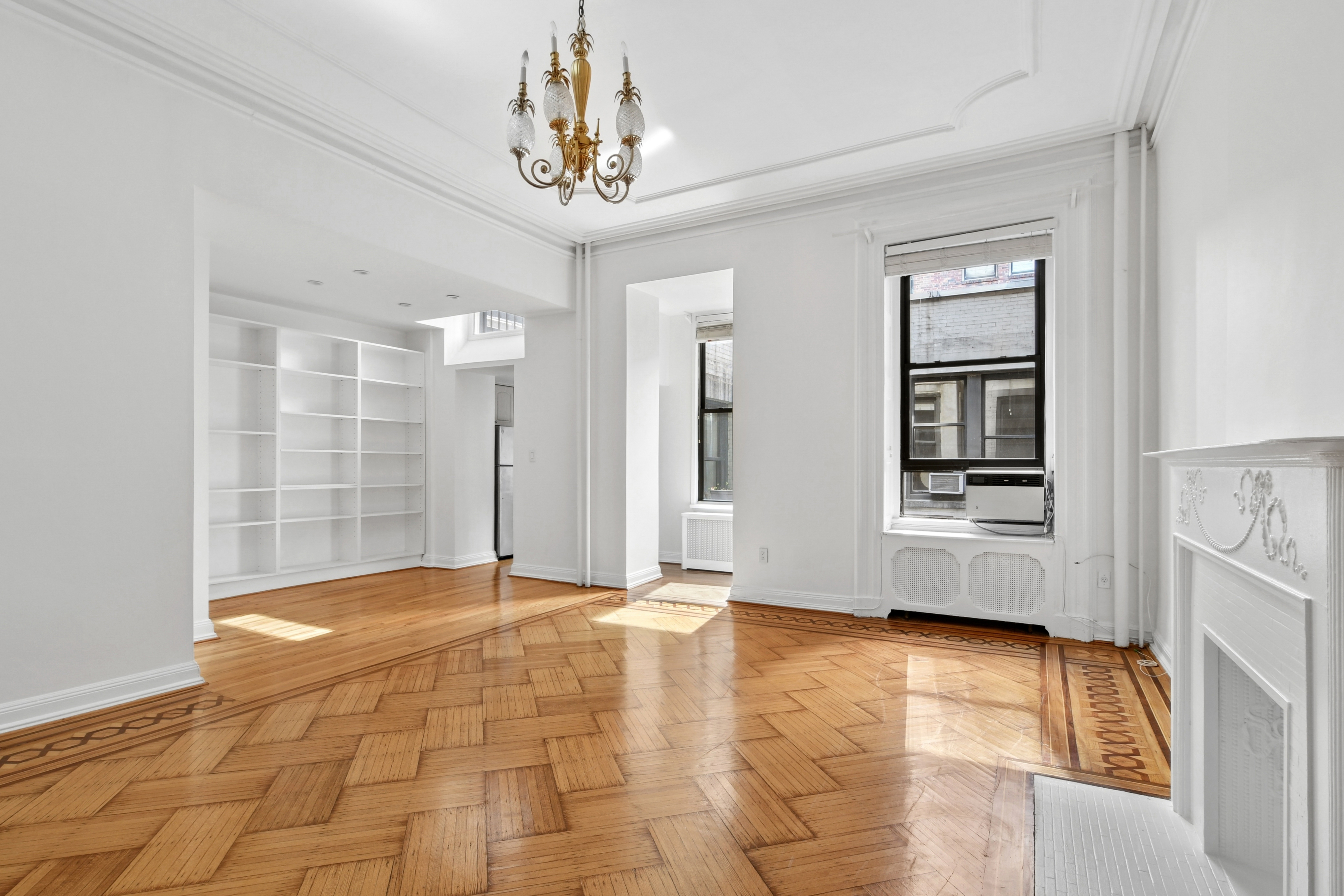 109 East 38th Street, Unit 3A Manhattan, NY 10016 - Photo 1 of 13 a view of an empty room with a window