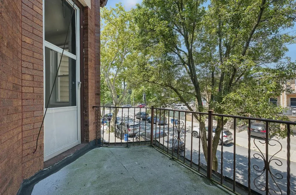 a view of backyard with green space