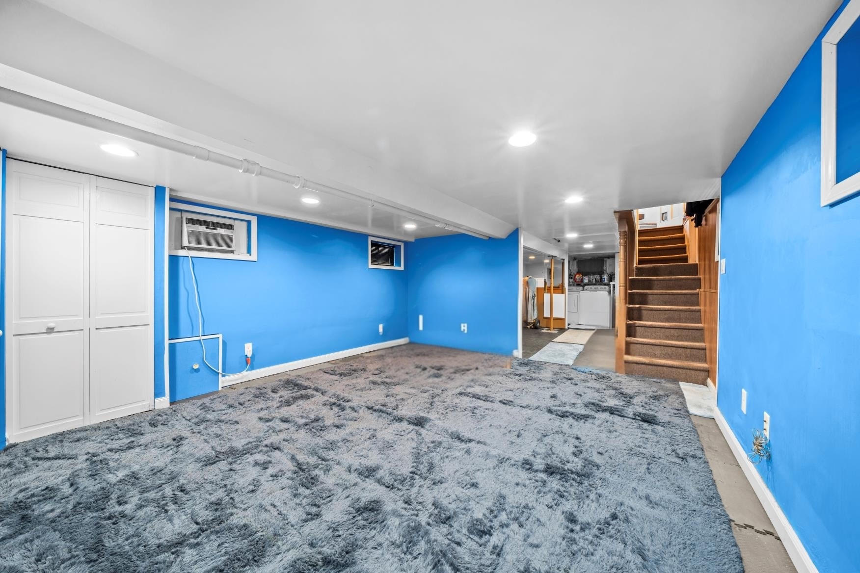 2018 Mill Avenue Brooklyn, NY 11234 - Photo 16 of 20 a view of a livingroom with a staircase
