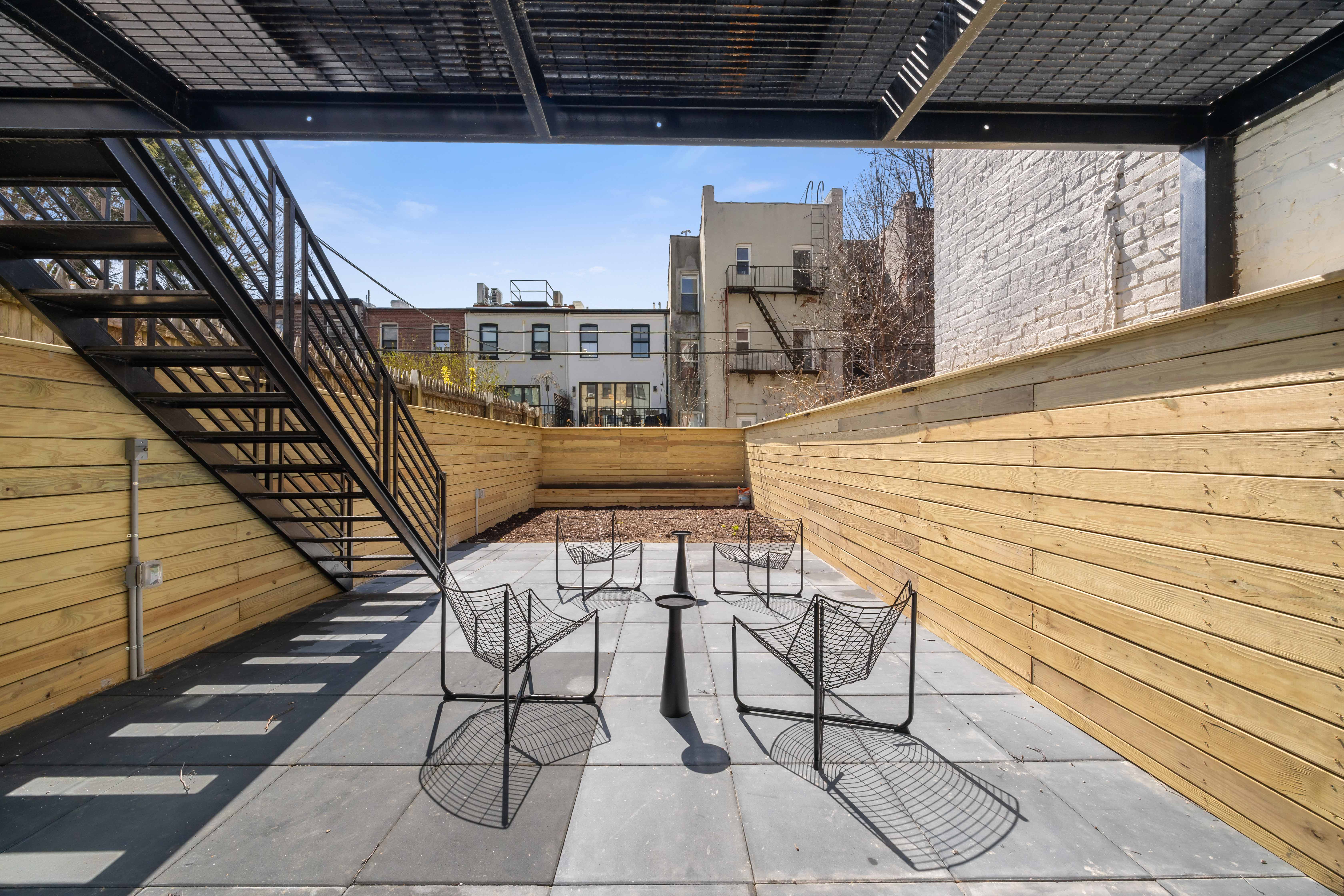 1000 Putnam Avenue Brooklyn, NY 11221 - Photo 16 of 18 a view of balcony with wooden floor and seating space