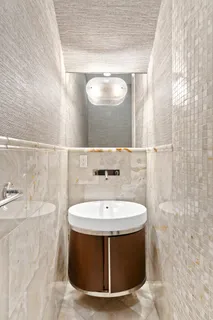 a spacious bedroom with a bed and a window