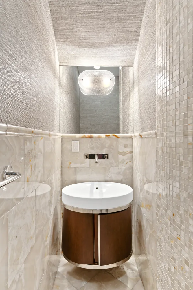 a spacious bedroom with a bed and a window