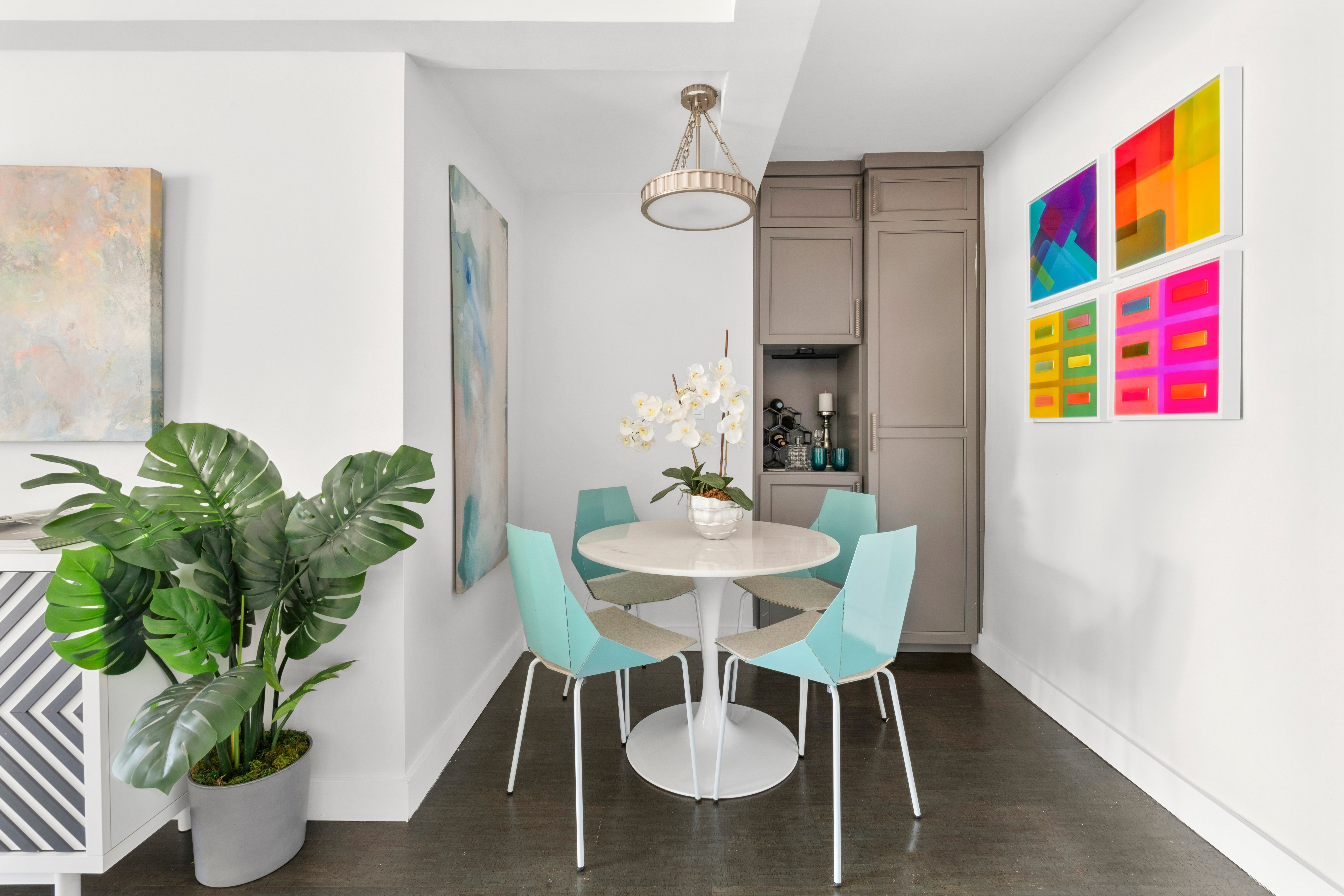 196 East 75th Street, Unit 16G Manhattan, NY 10021 - Photo 3 of 10 a view of a dining room with furniture and wooden floor
