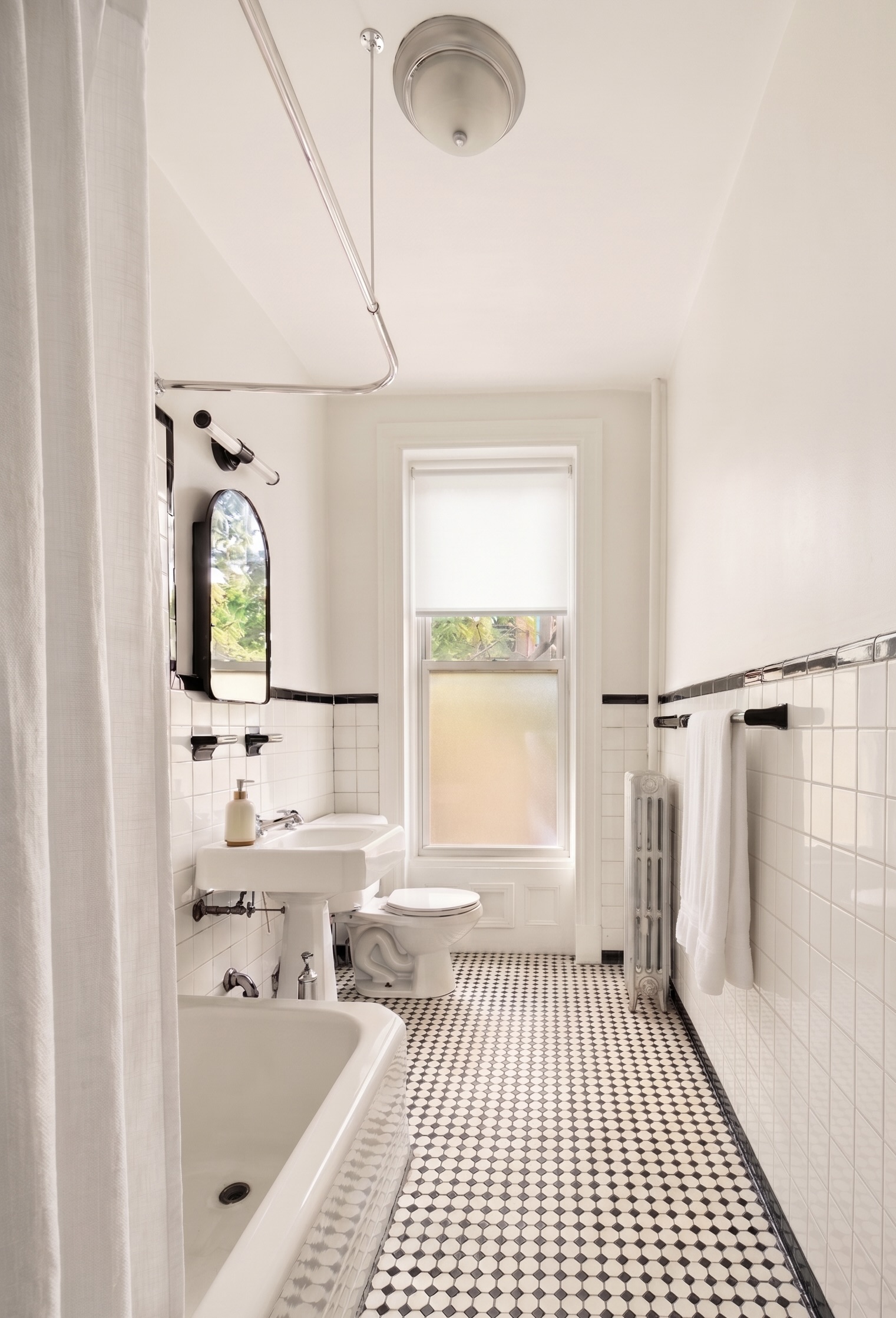 462 9th Street, Unit 2 Brooklyn, NY 11215 - Photo 12 of 14 a bathroom with a bathtub and a shower