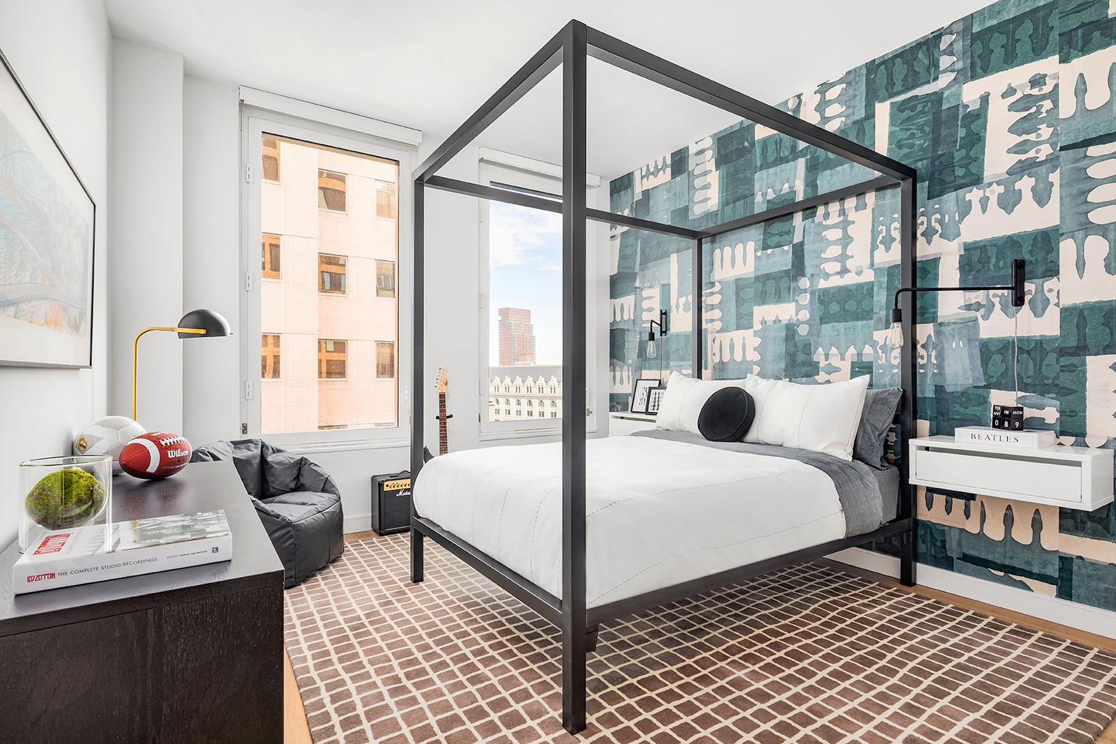 146 Pierrepont Street, Unit 2C Brooklyn, NY 11201 - Photo 8 of 30 a bedroom with a bed a large window and potted plants