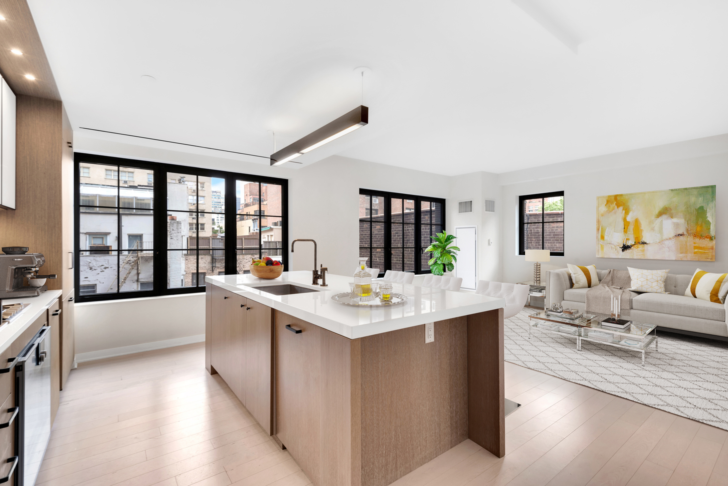 a large kitchen with a large window and counter