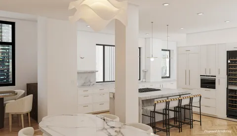 a bathroom with a sink a chair and a large mirror