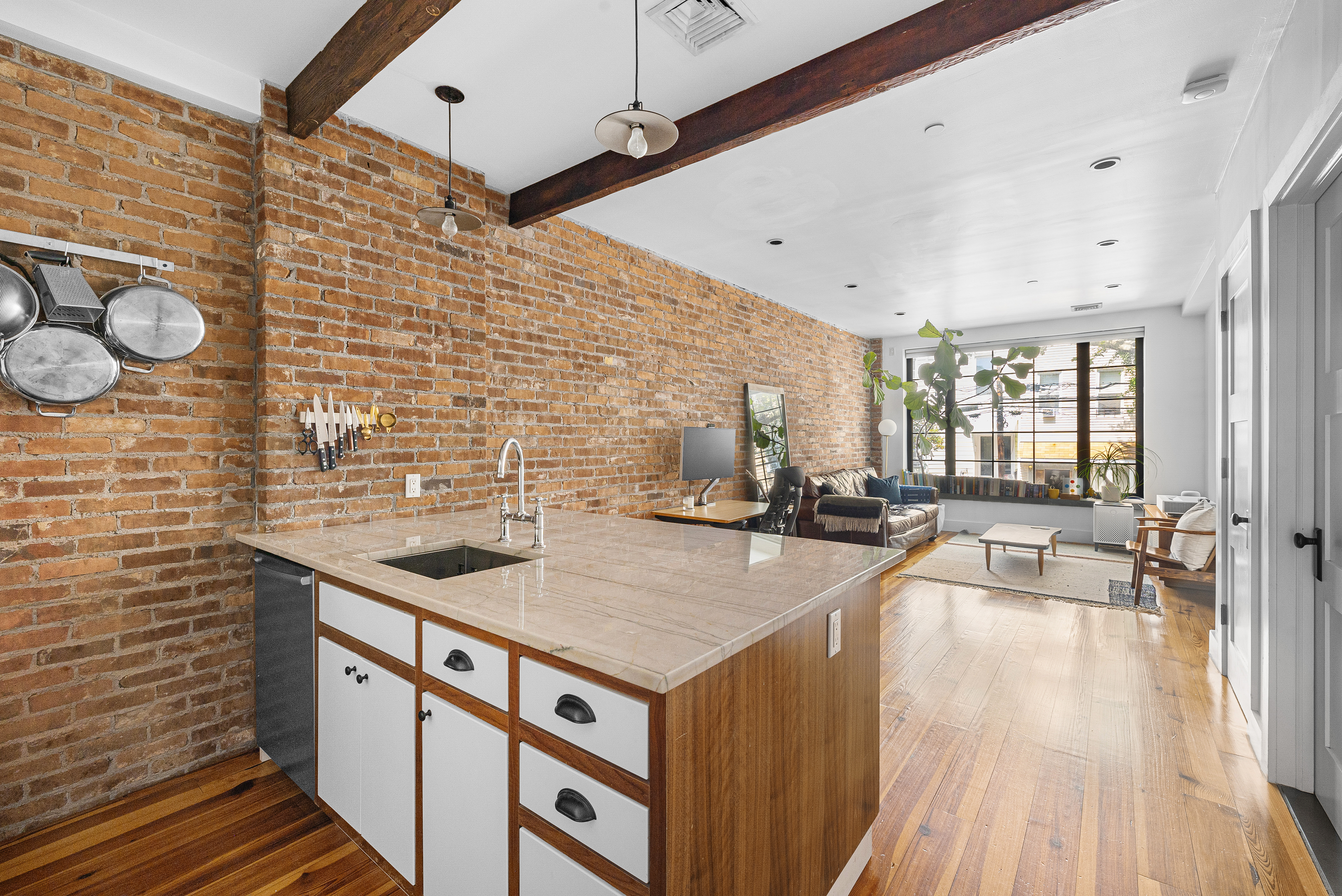 174 Jackson Street, Unit 2A Brooklyn, NY 11211 - Photo 4 of 17 a kitchen with sink stove and cabinets