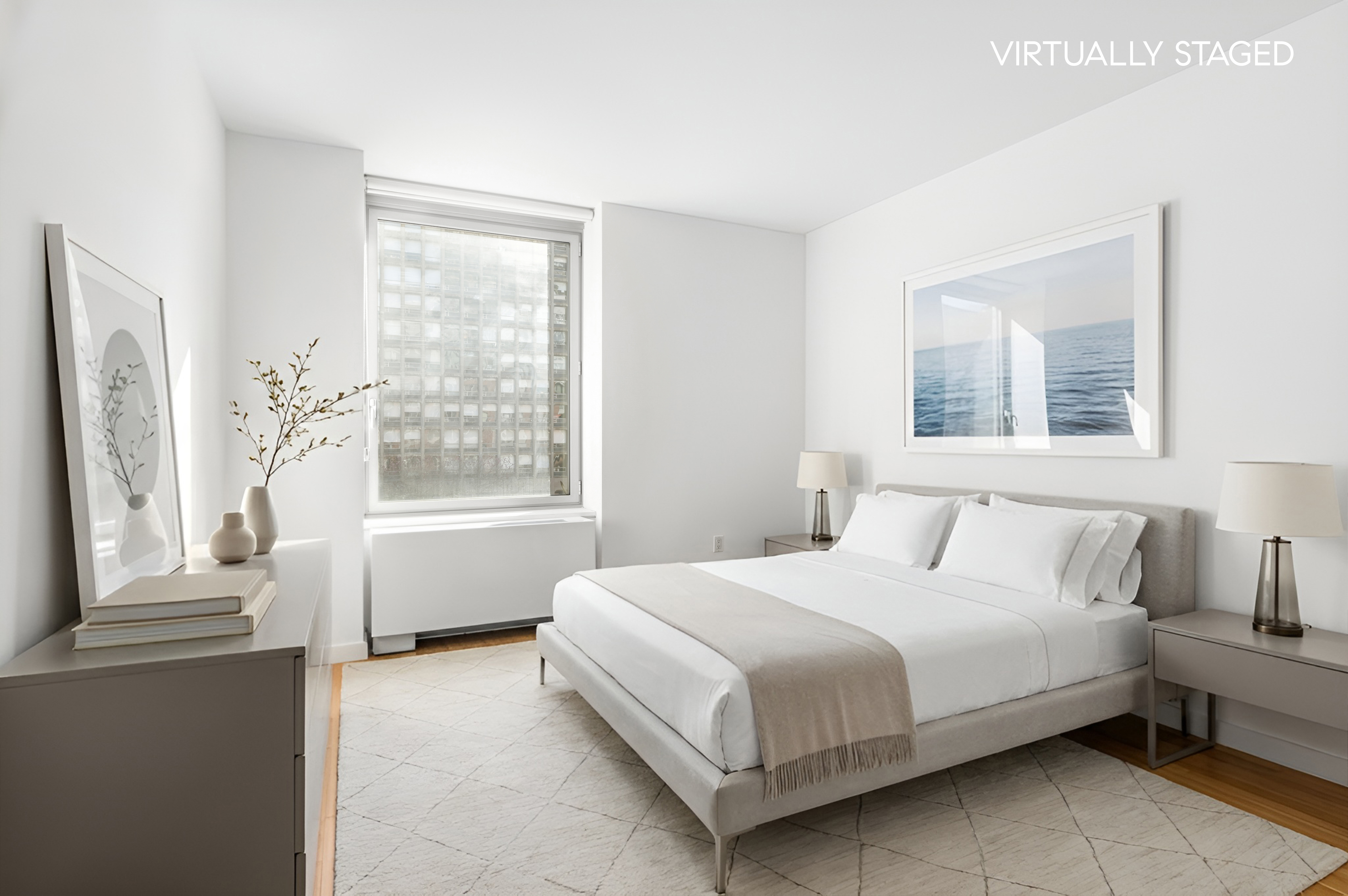 303 East 33rd Street, Unit 5H Manhattan, NY 10016 - Photo 4 of 18 a bedroom with a large bed and a window