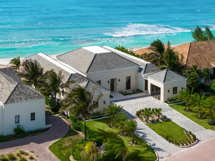 a aerial view of a house with a yard