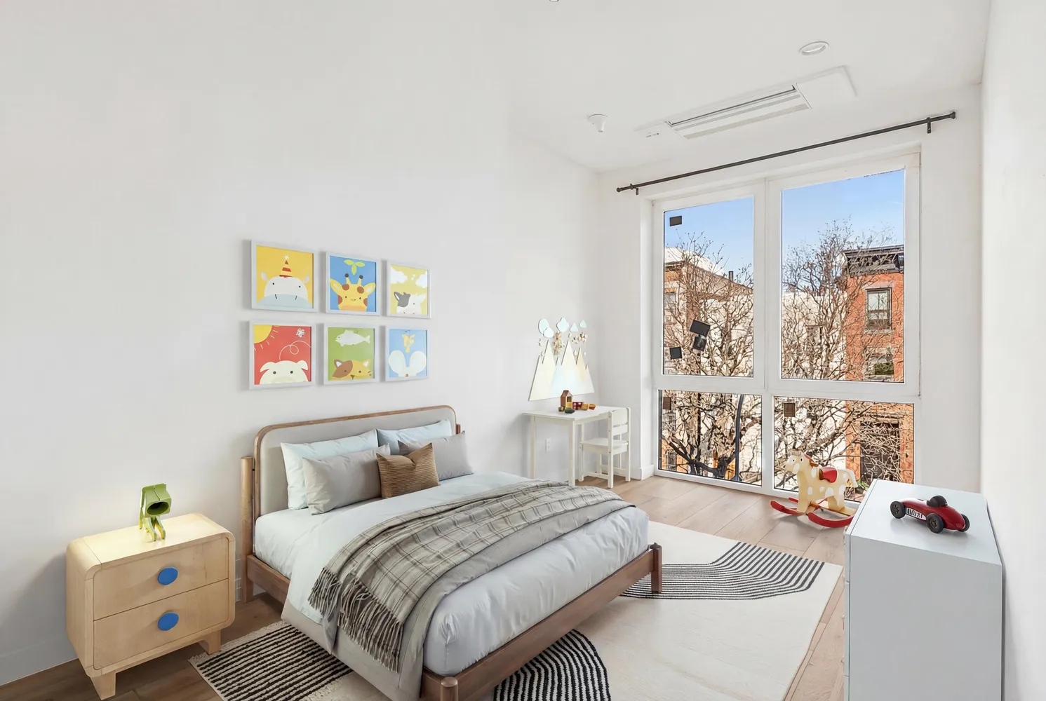 a bedroom with a bed and a couch