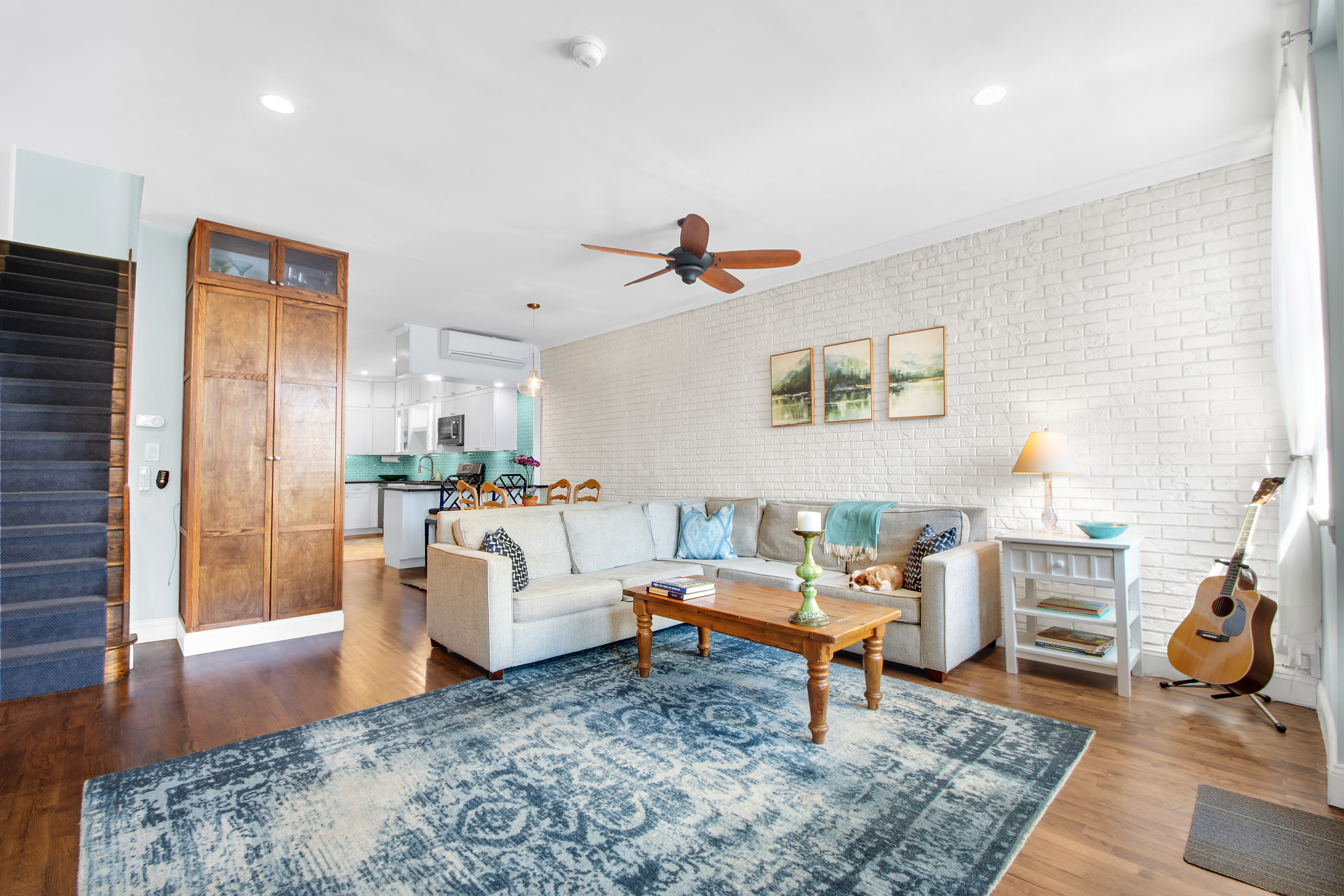 594 6th Avenue, Unit 3 Brooklyn, NY 11215 - Photo 2 of 11 a living room with furniture and wooden floor