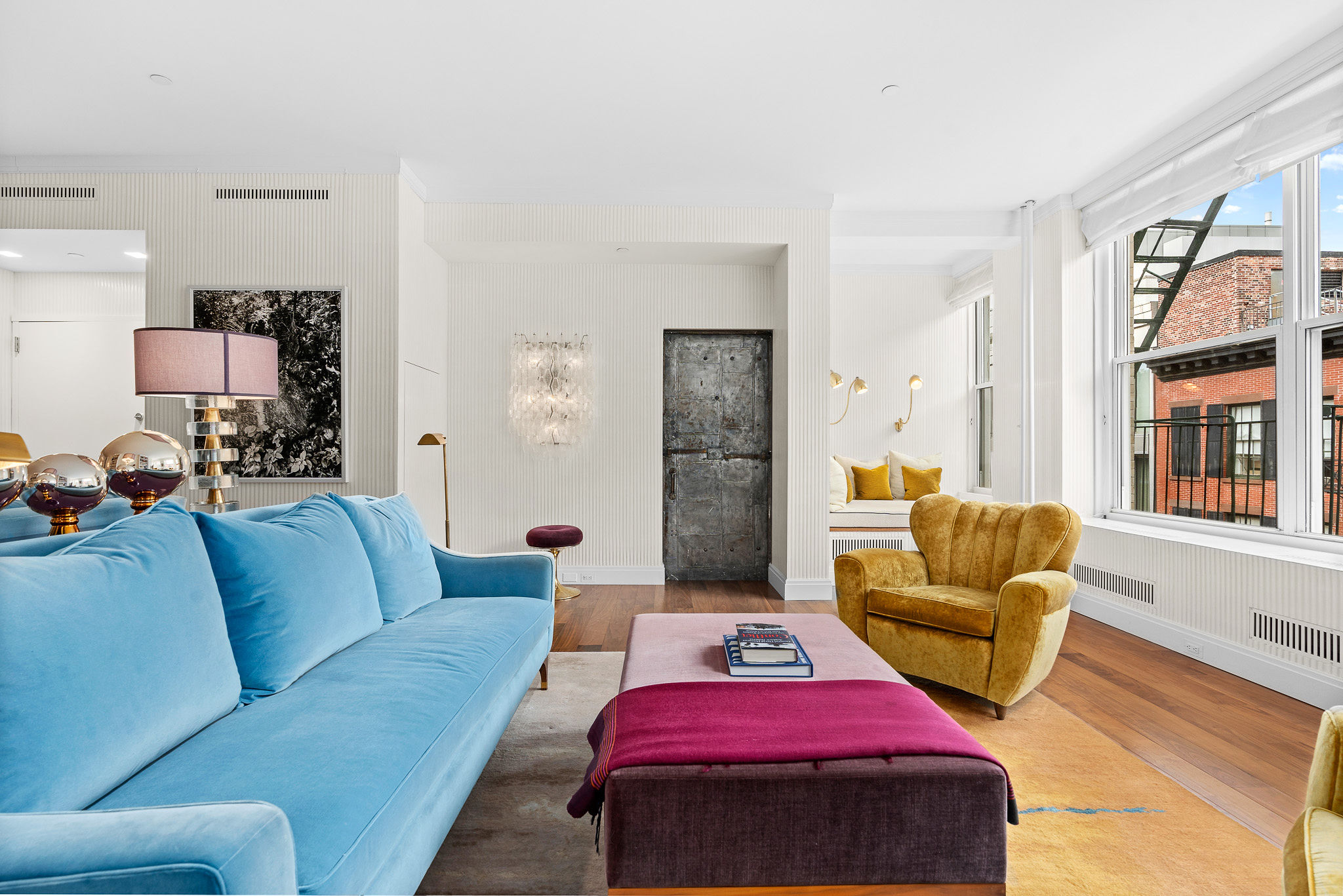 45 Crosby Street, Unit 6 North Manhattan, NY 10012 - Photo 2 of 17 a living room with furniture or couch and a window