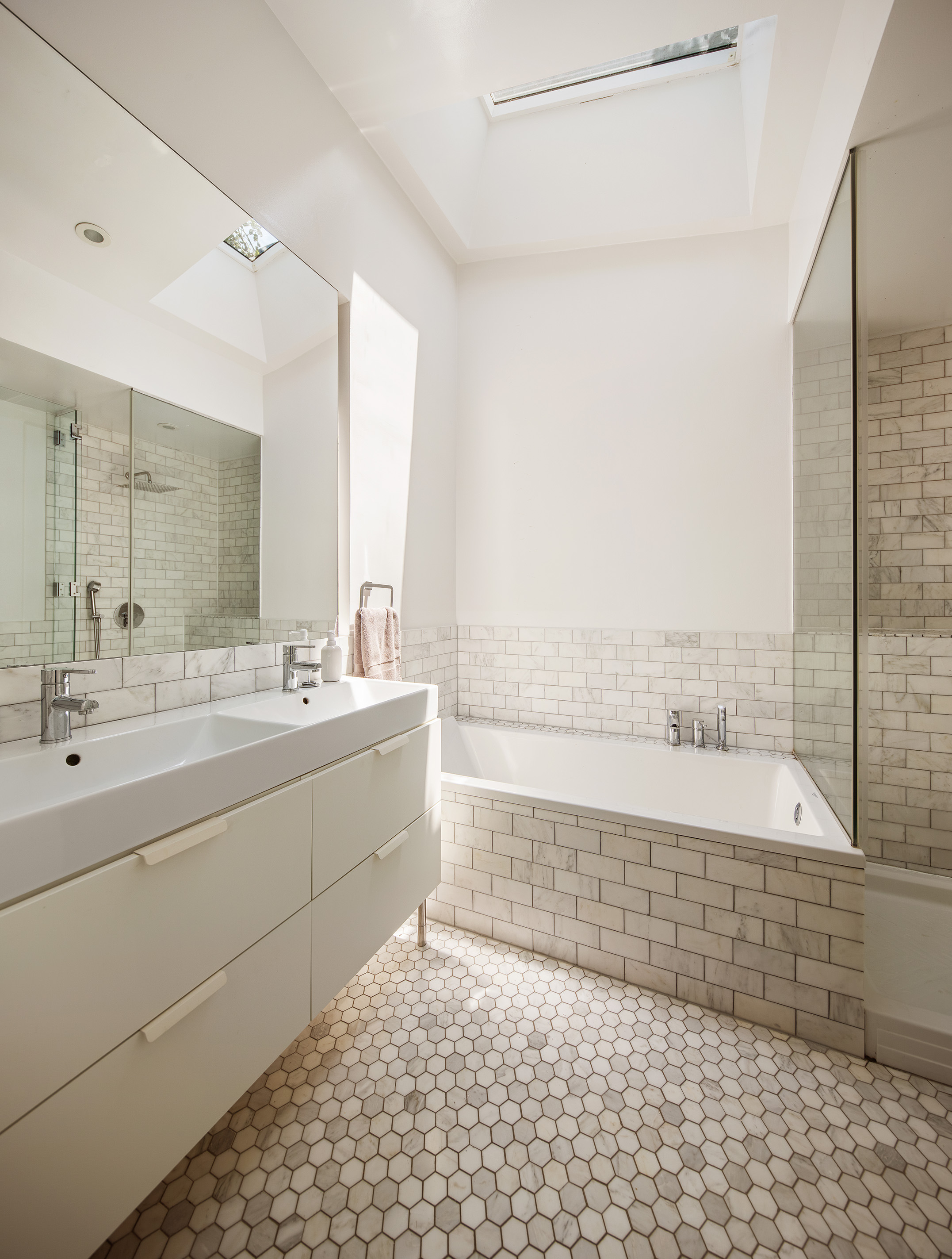 47 Wolcott Street Brooklyn, NY 11231 - Photo 17 of 24 a bathroom with a bathtub and a sink