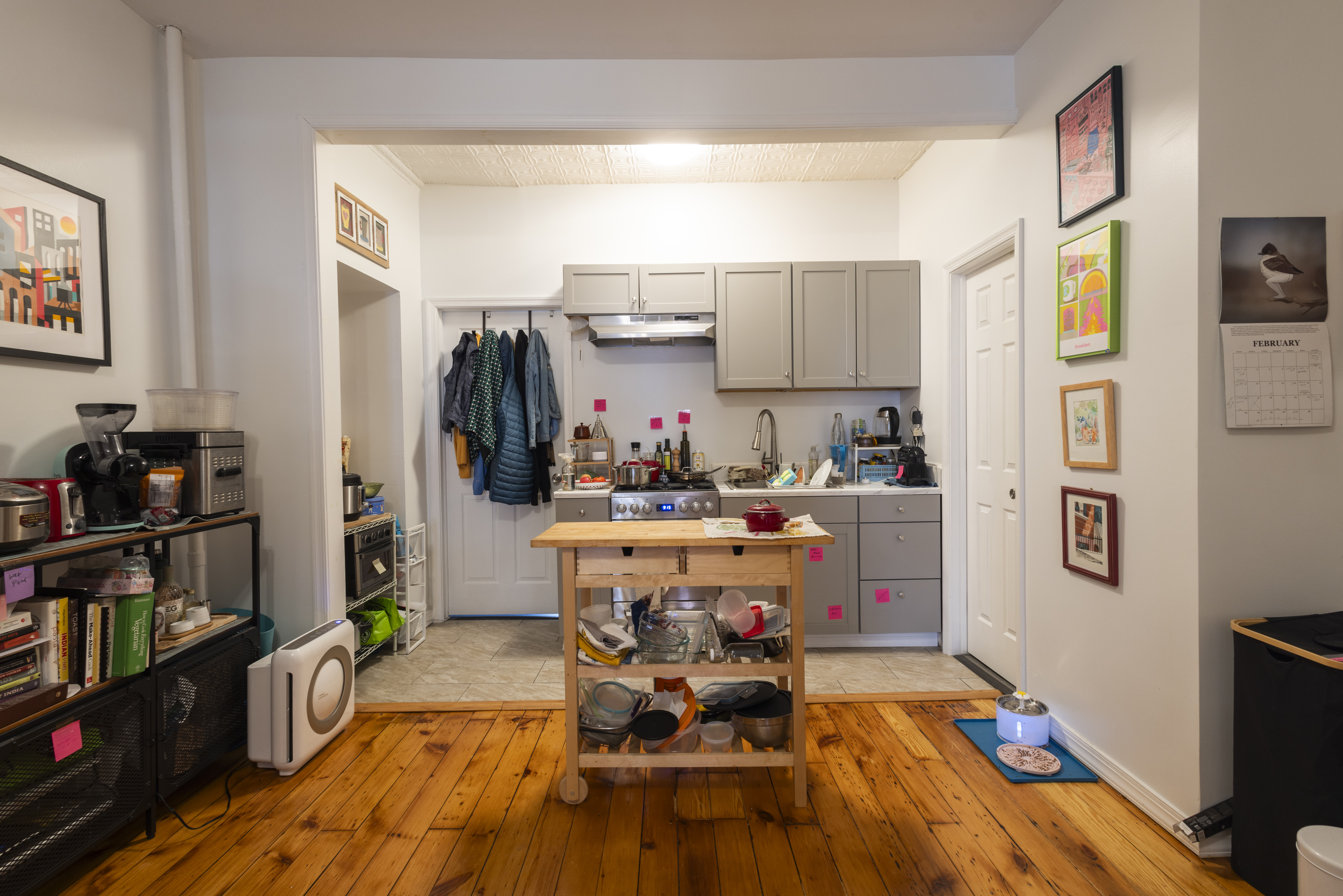 40 A Jewel Street, Unit 2 Brooklyn, NY 11222 - Photo 5 of 10 a living room with furniture and a book shelf