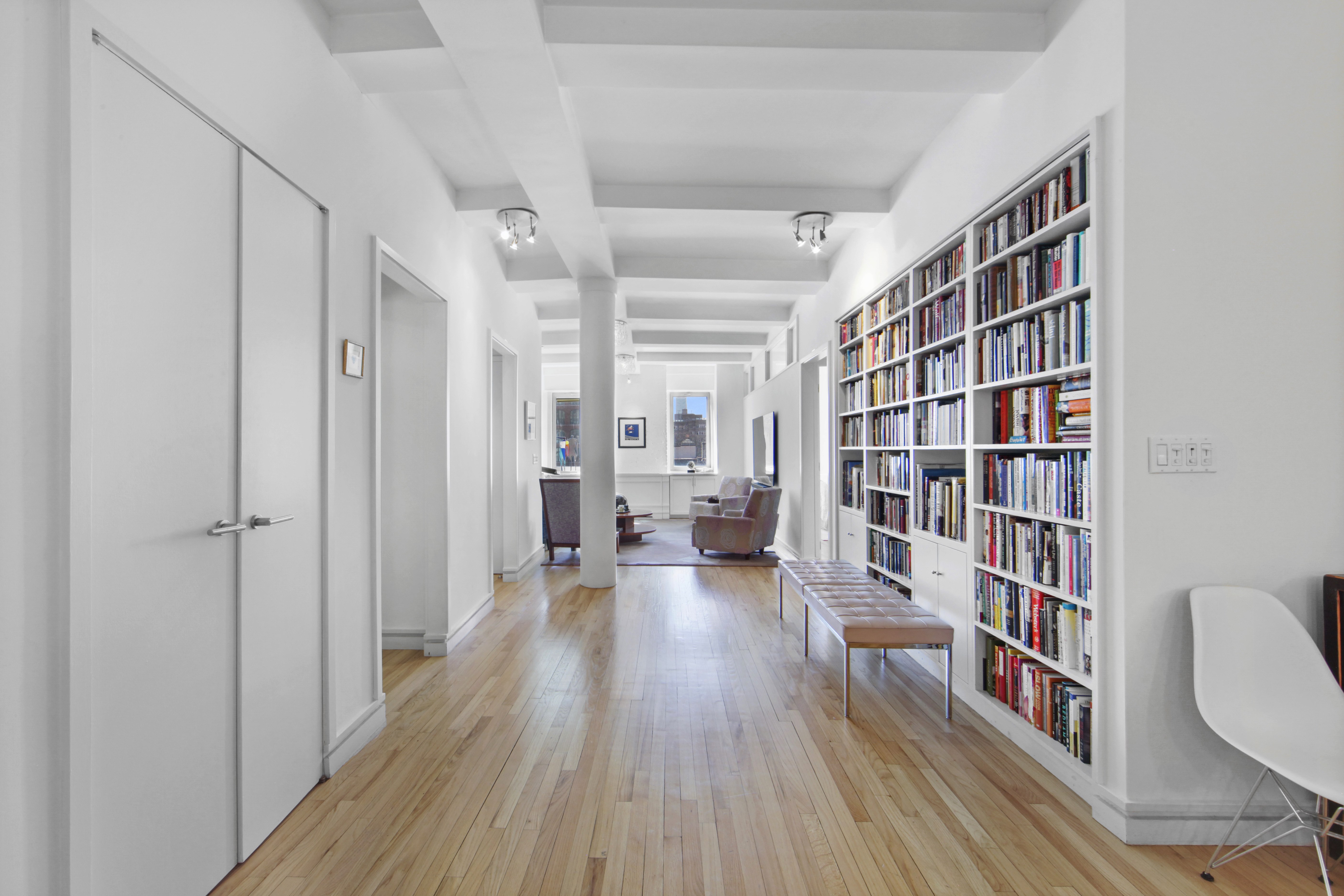 18 East 12th Street, Unit 7BC Manhattan, NY 10003 - Photo 7 of 26 a view of a livingroom with furniture and staircase