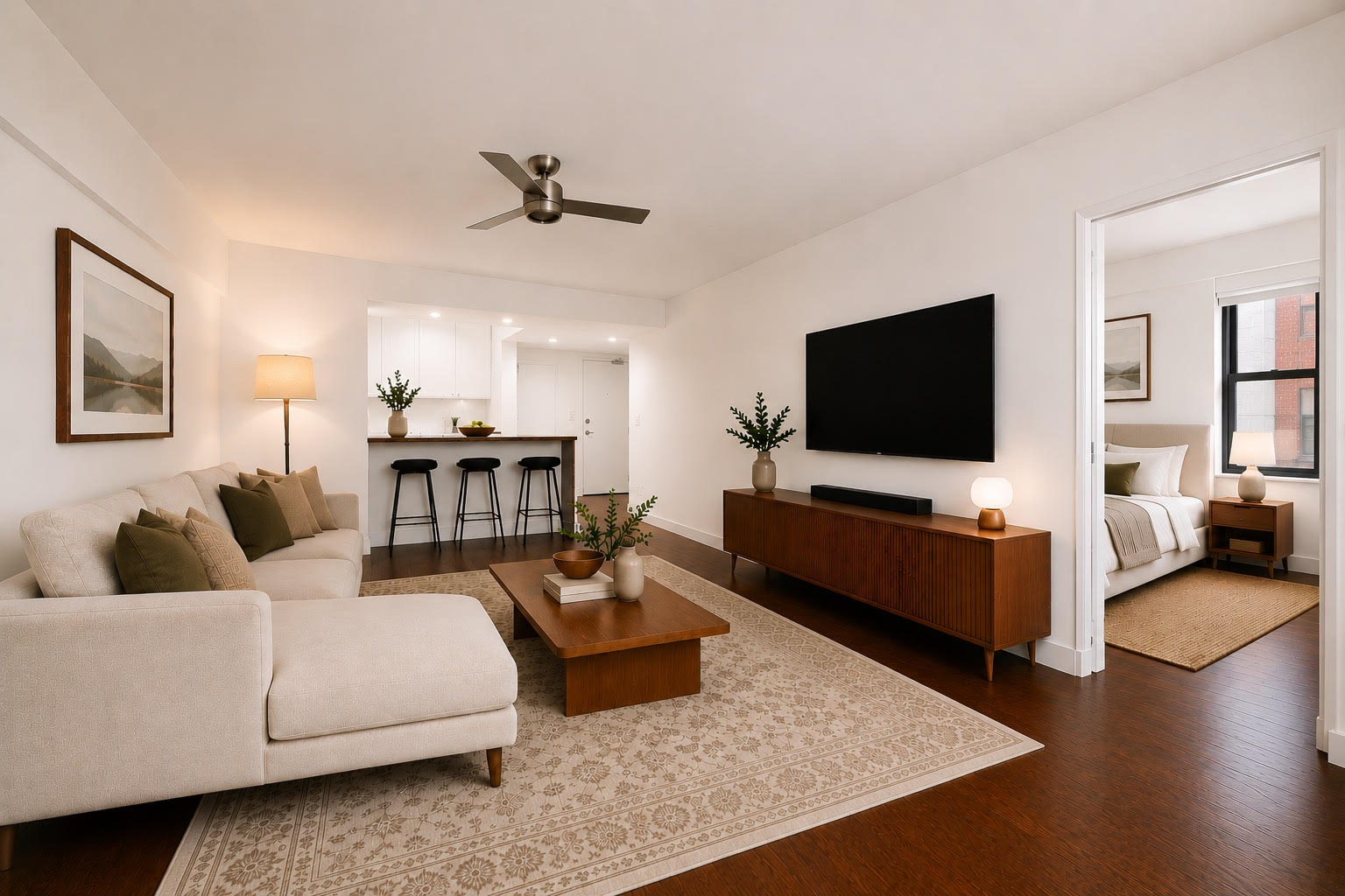 180 West Houston Street, Unit 2E Manhattan, NY 10014 - Photo 3 of 7 a living room with furniture and a flat screen tv