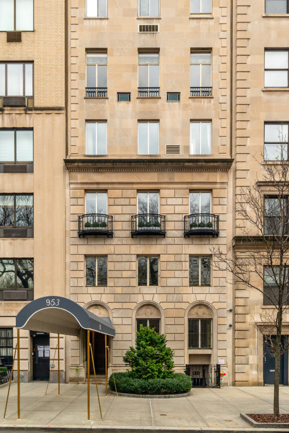 953 5th Avenue, Unit PH Manhattan, NY 10075 - Photo 26 of 27 a front view of a building with glass windows
