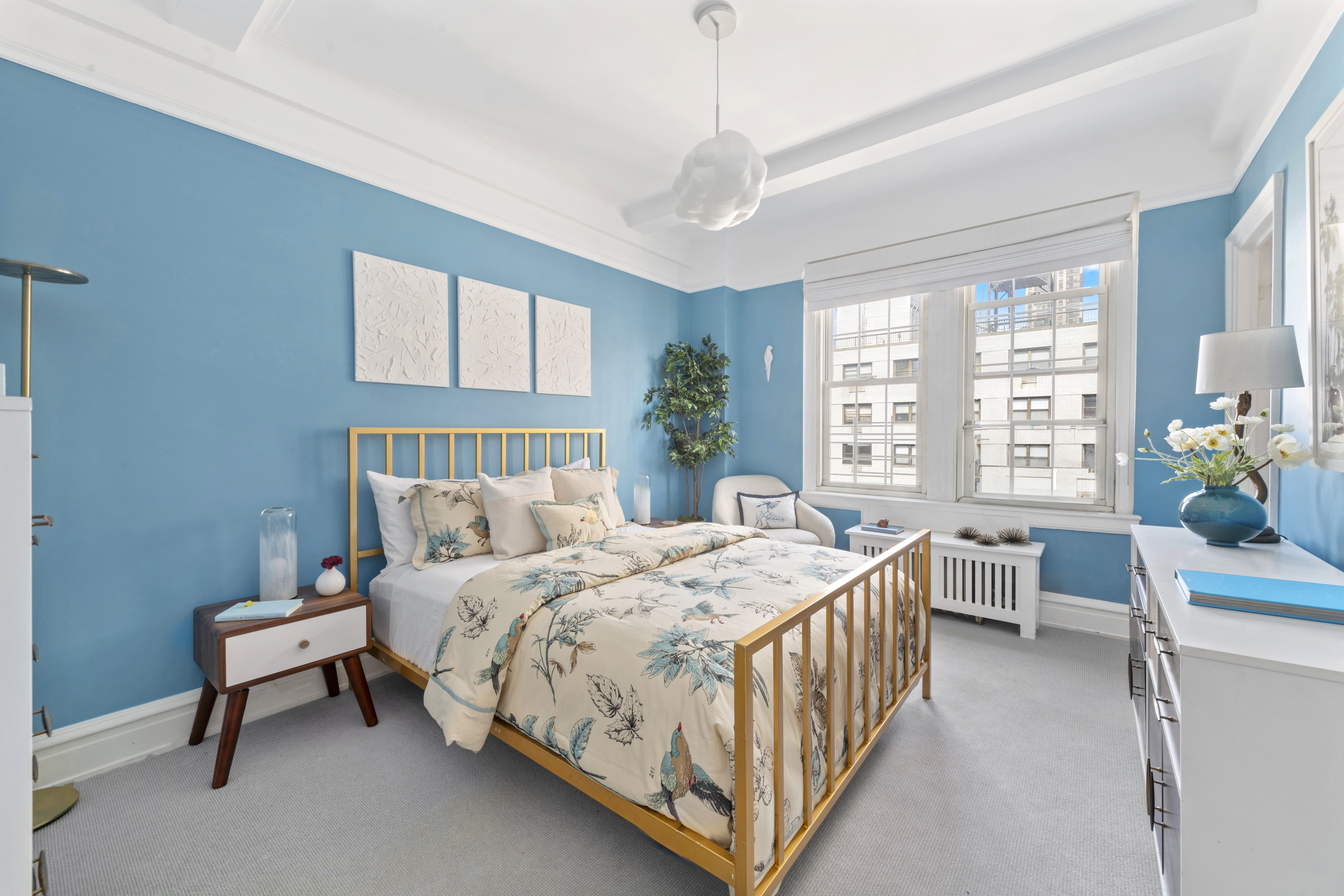 410 East 57th Street, Unit 15BE Manhattan, NY 10022 - Photo 11 of 18 a bedroom with a bed and a table chair