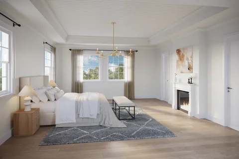 a living room with furniture fireplace and window