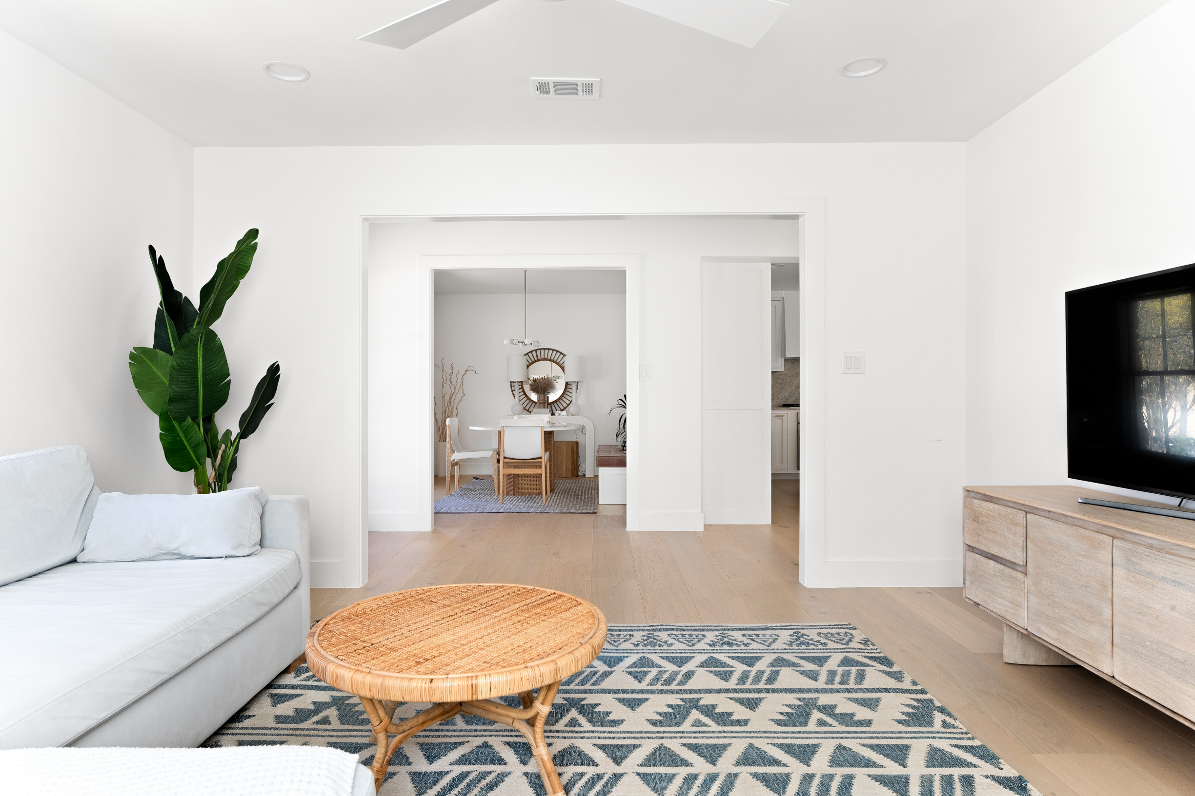 1317 Thaddeus Cove Austin, TX 78746 - Photo 11 of 22 a living room with furniture and a flat screen tv