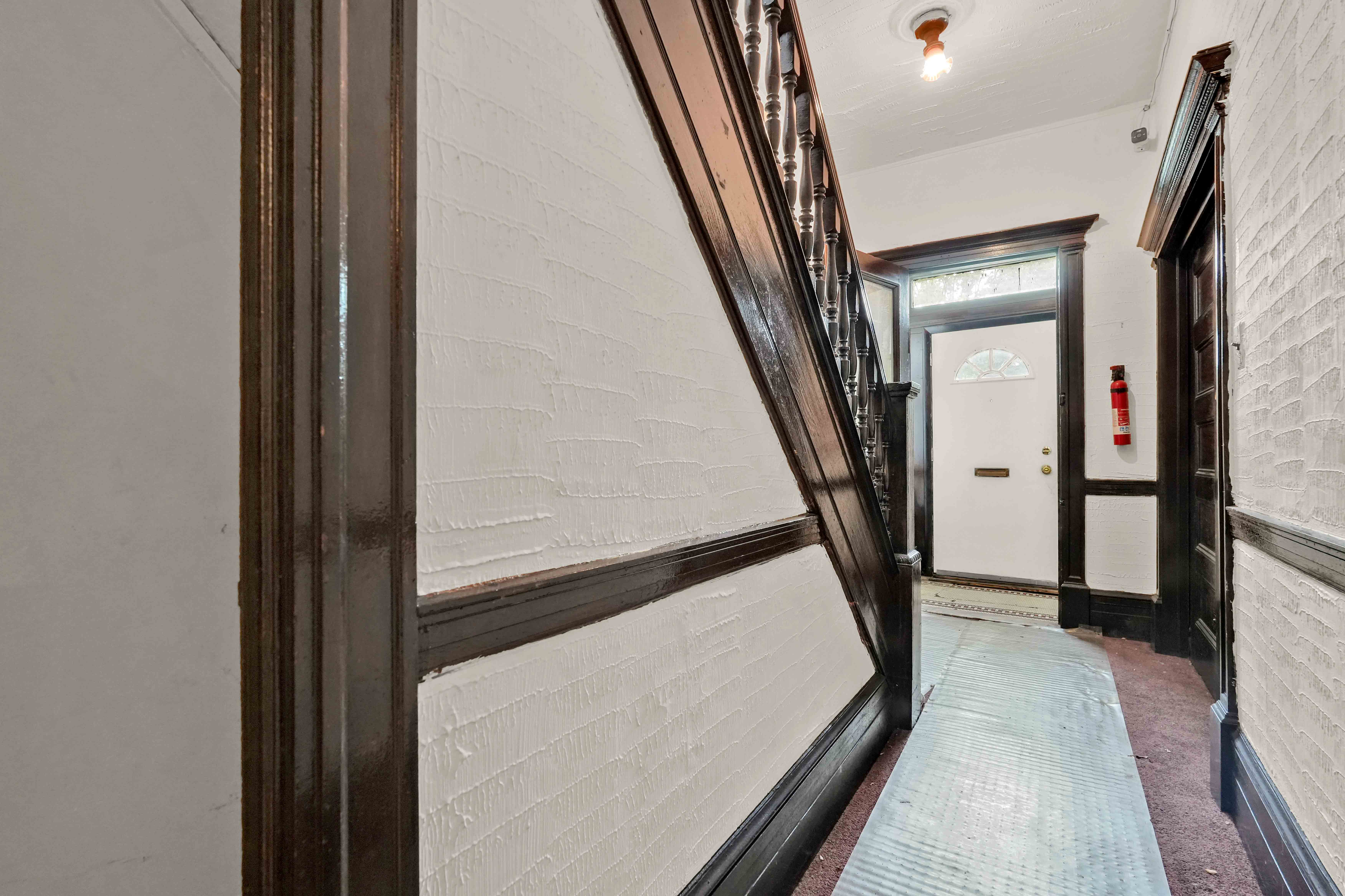 278 Lefferts Avenue Brooklyn, NY 11225 - Photo 42 of 56 a view of an entryway with a floor to ceiling window