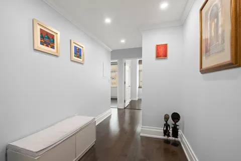 a view of a hallway with front door