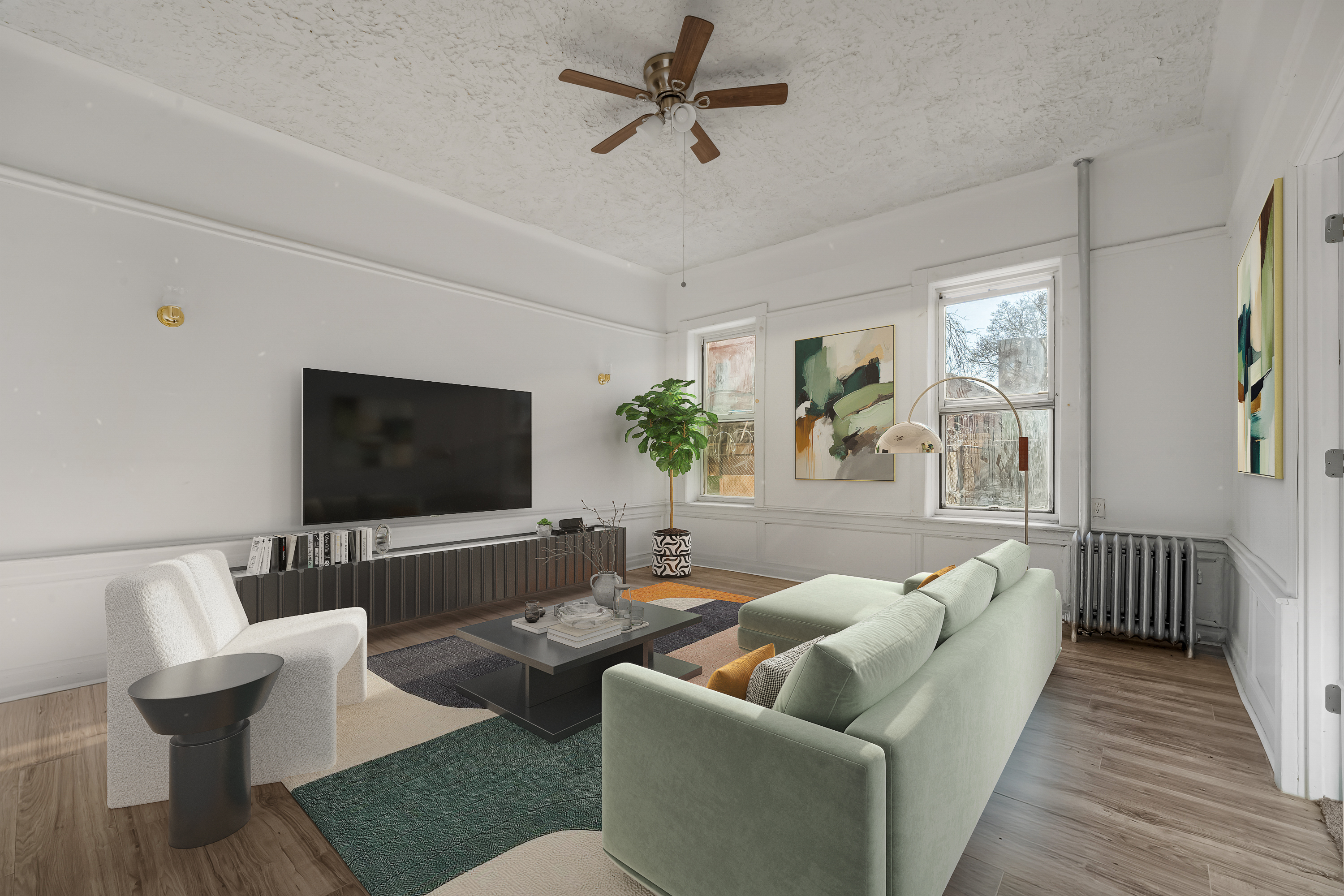 a living room with furniture and a flat screen tv