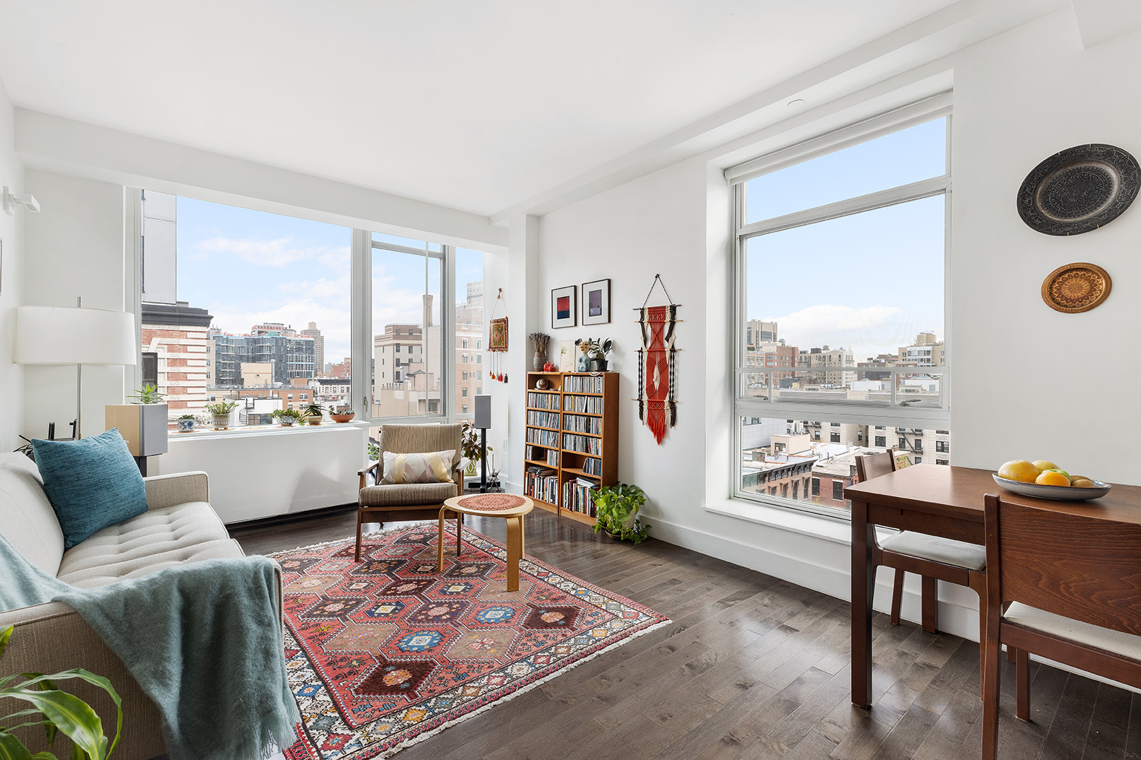 88 Morningside Avenue, Unit 8F Manhattan, NY 10027 - Photo 2 of 9 a living room with furniture and a floor to ceiling window