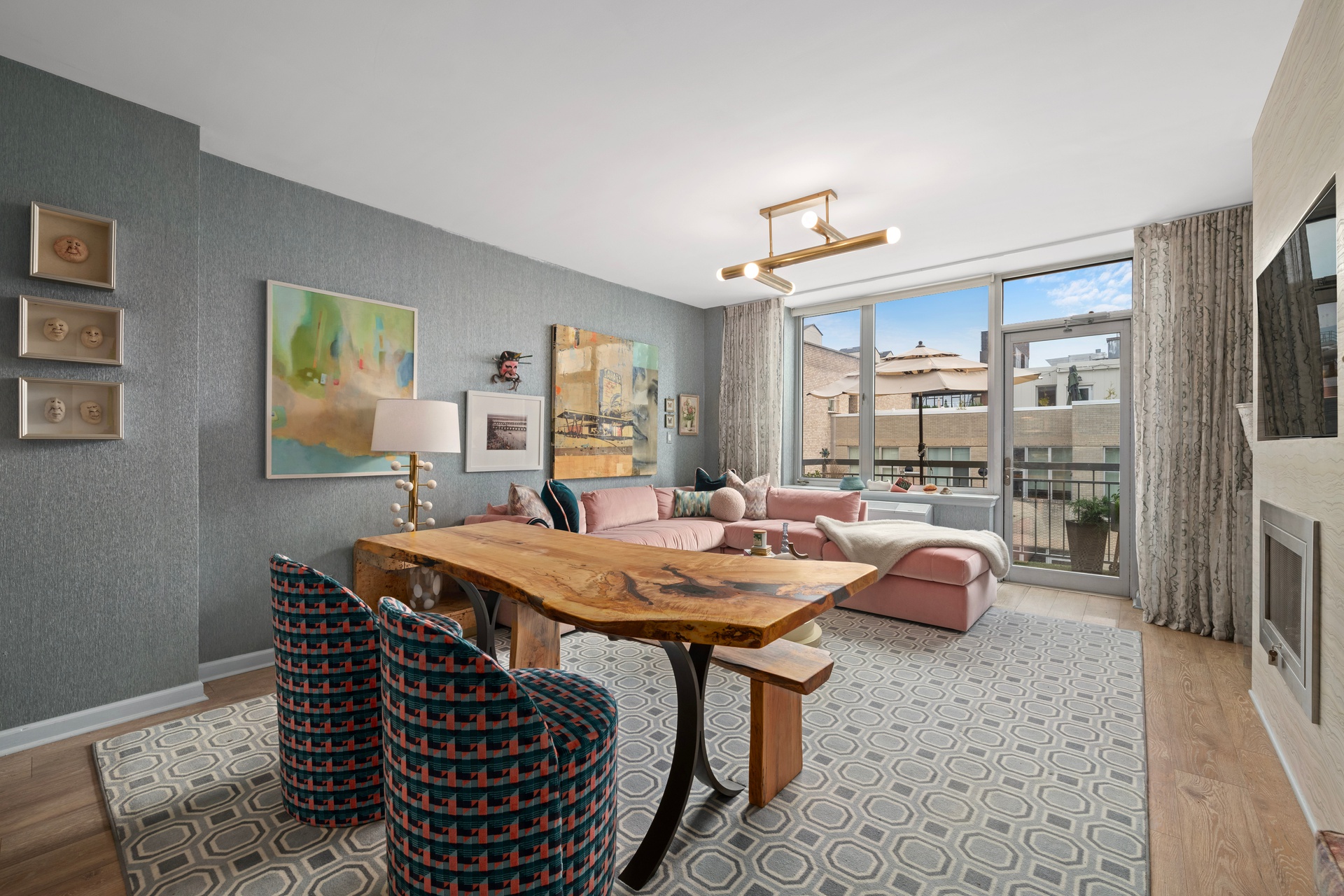 26 Broadway, Unit 602 Brooklyn, NY 11249 - Photo 2 of 12 a view of a livingroom with furniture and window